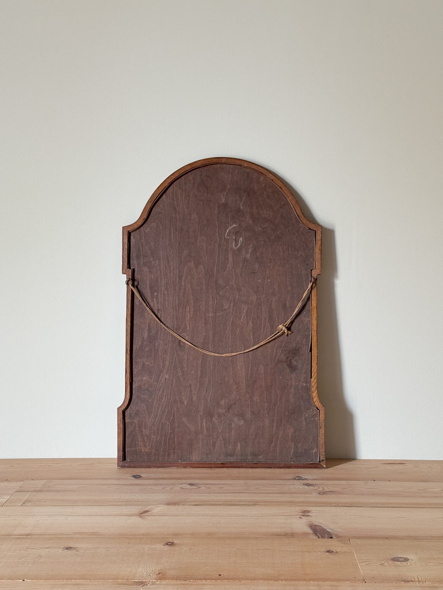 Antique mahogany curved mirror