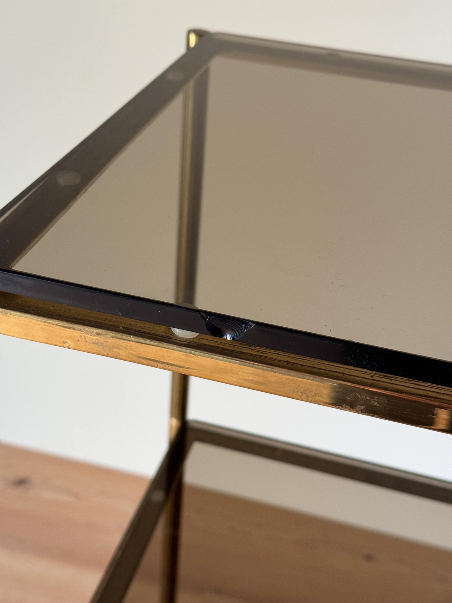 Mid-century brass and smoked glass shelving unit