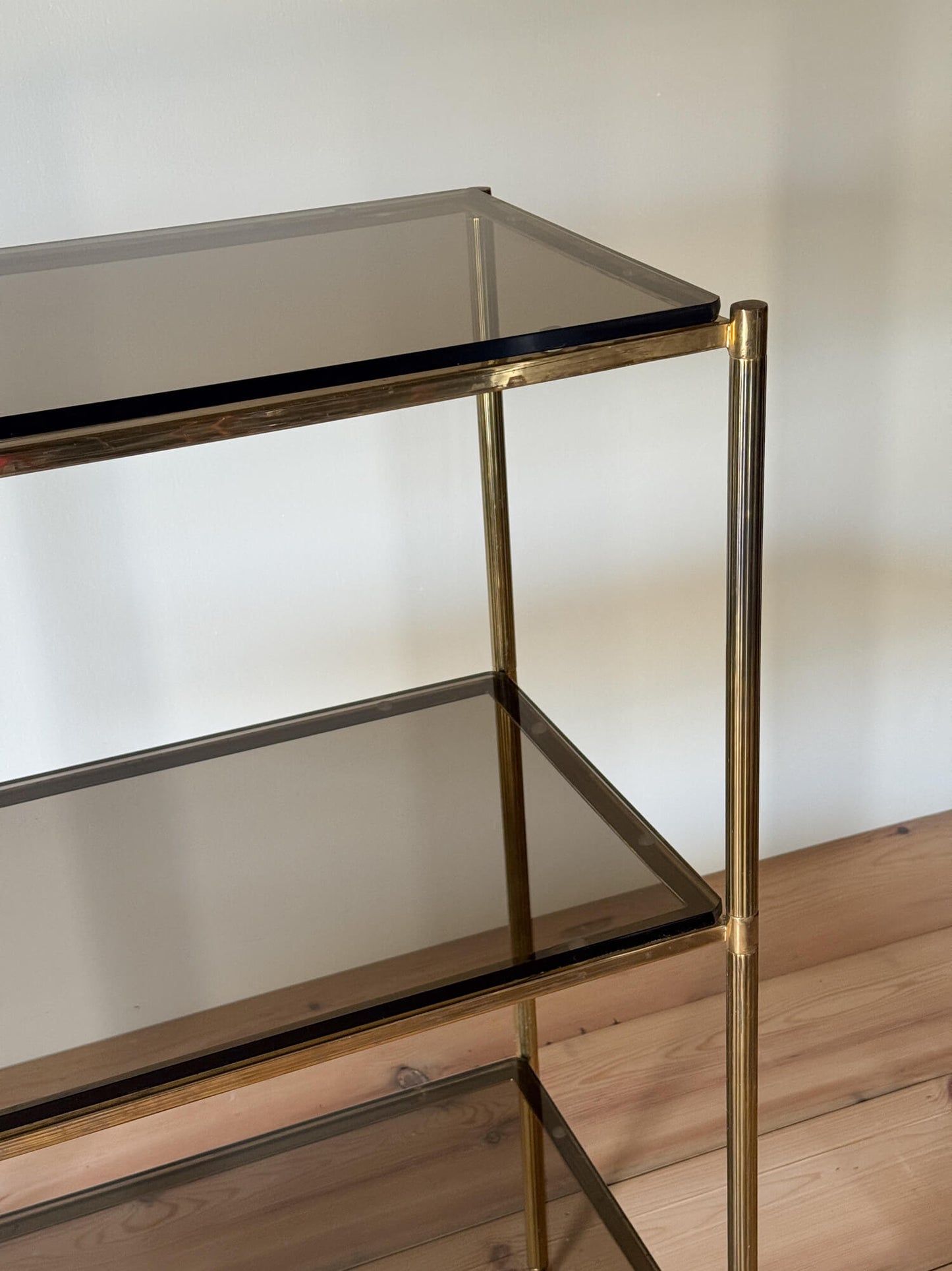 Mid-century brass and smoked glass shelving unit