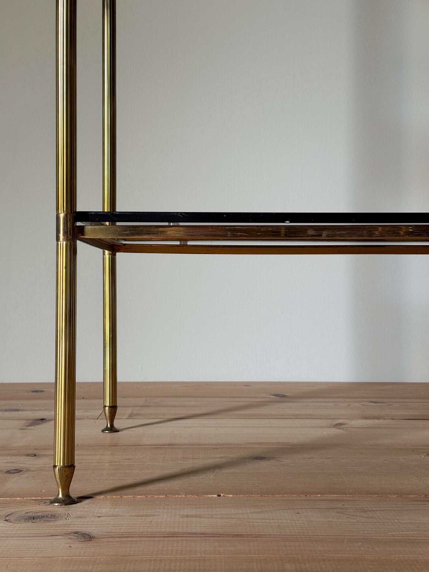 Mid-century brass and smoked glass shelving unit