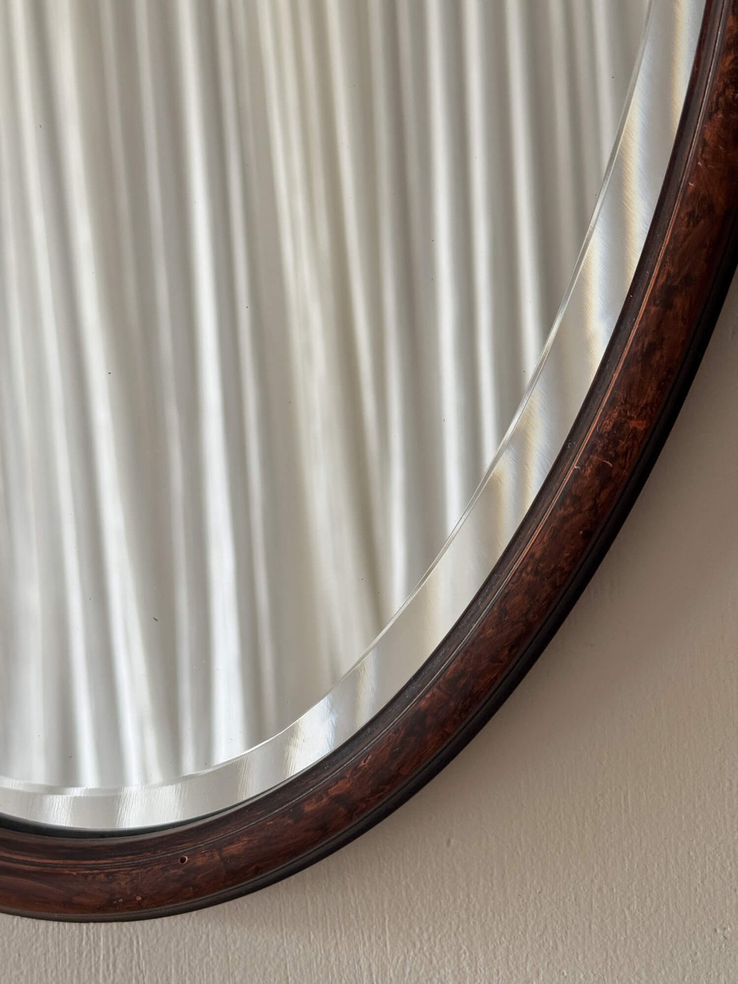 Victorian mahogany oval mirror