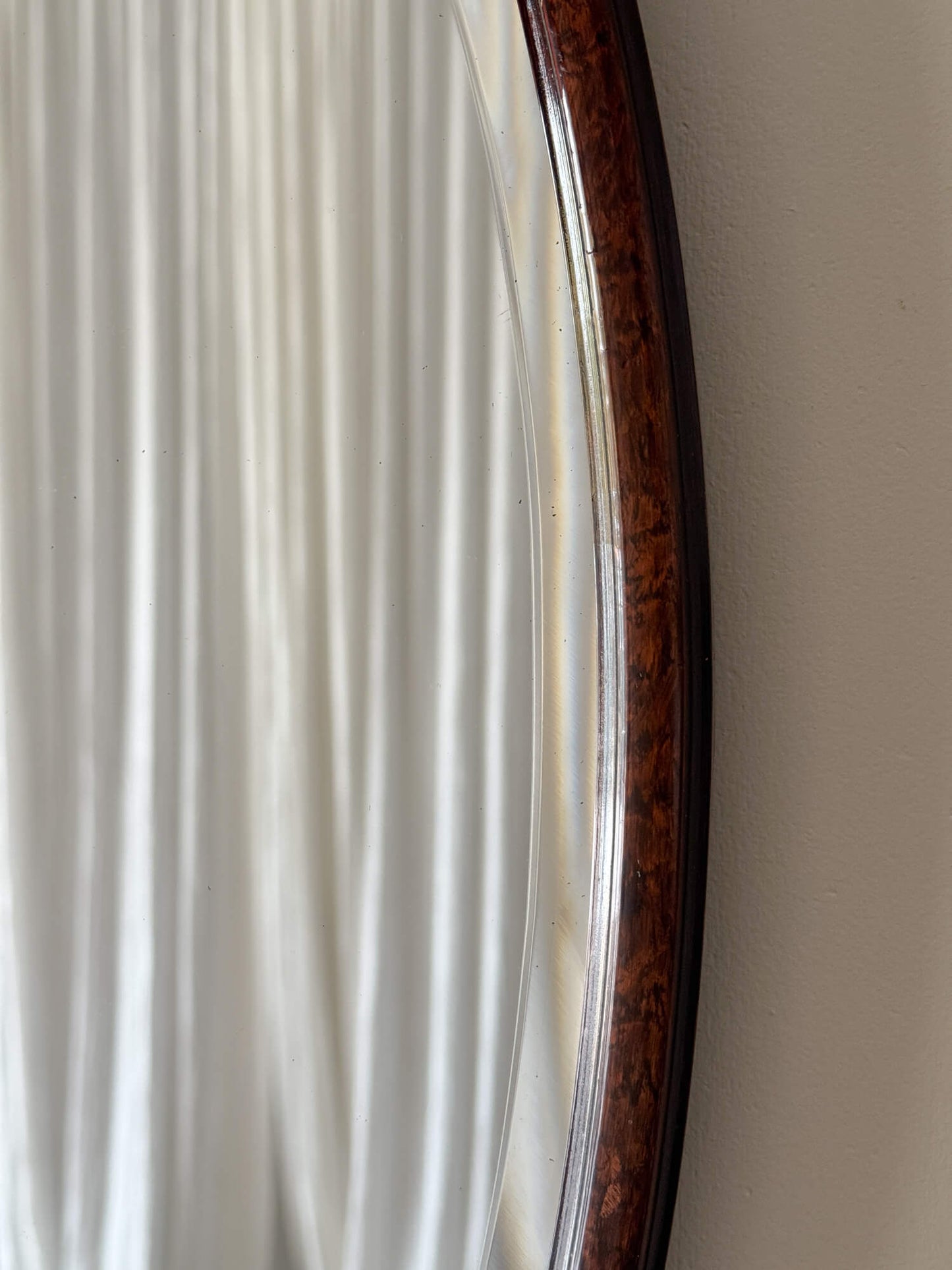Victorian mahogany oval mirror
