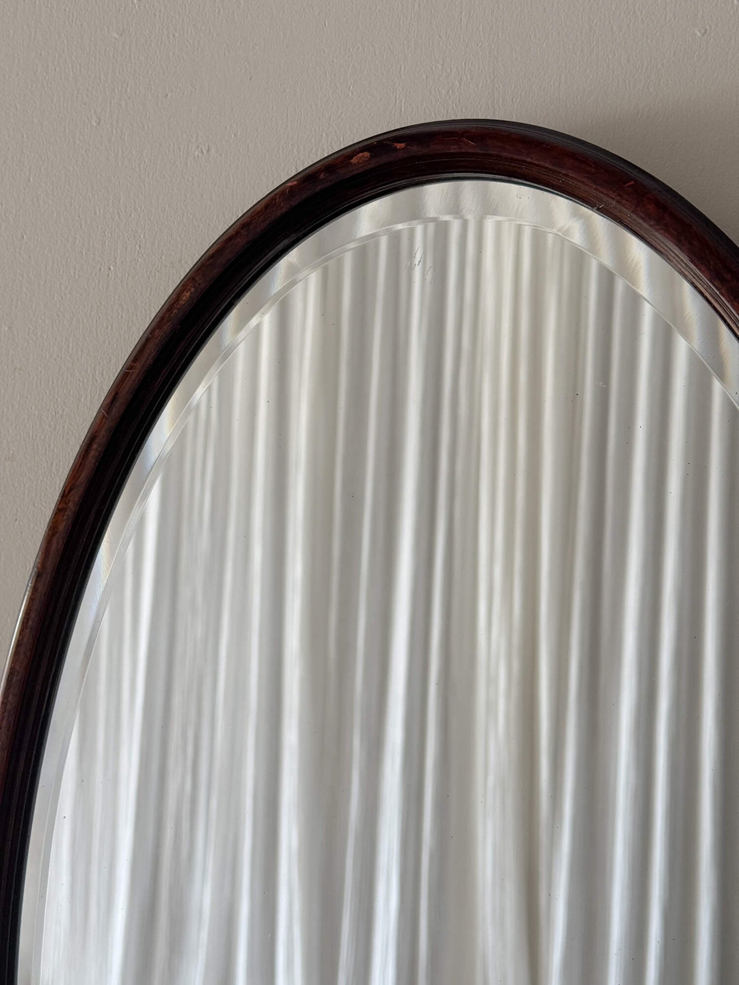 Victorian mahogany oval mirror