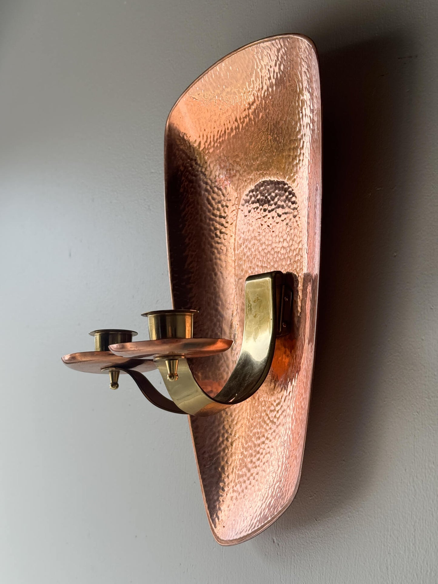 Mid-century hammered copper candle sconce