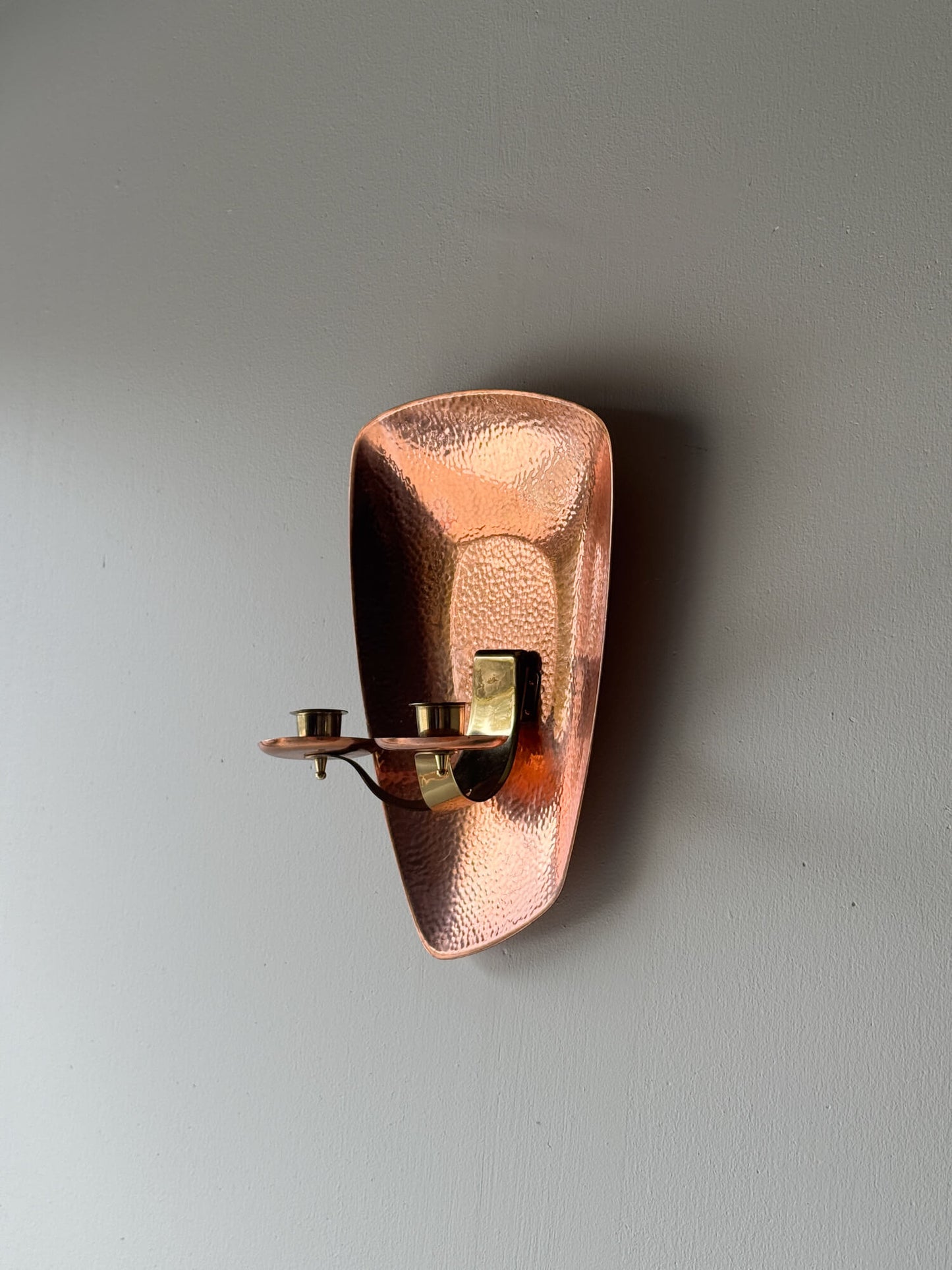 Mid-century hammered copper candle sconce