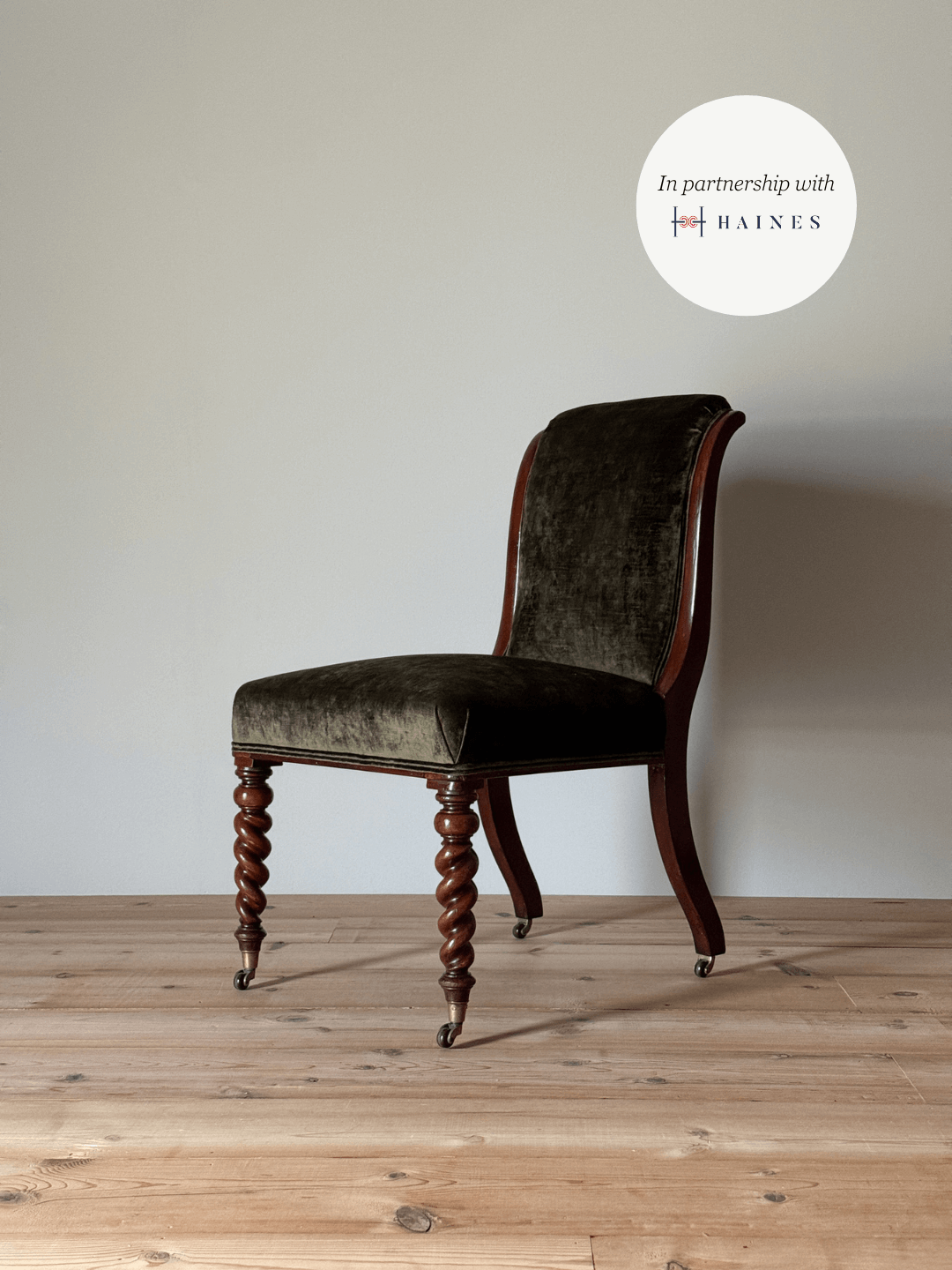 Antique occasional chair raised on barley twist legs