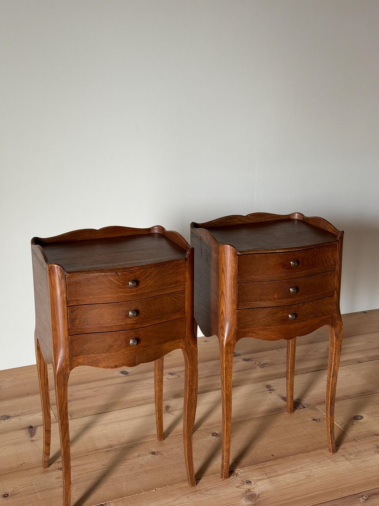 Pair of French vintage bedside tables with three drawers