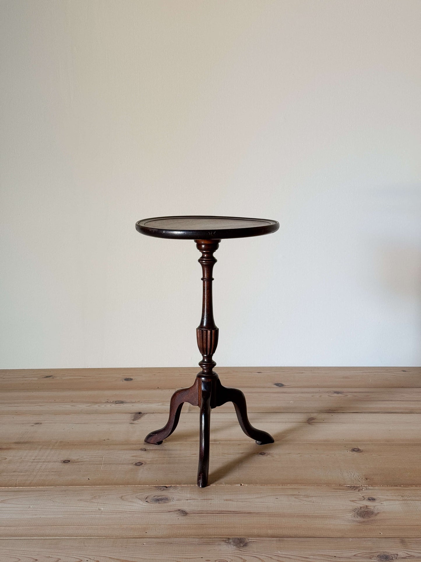 Vintage mahogany wine table on splayed legs