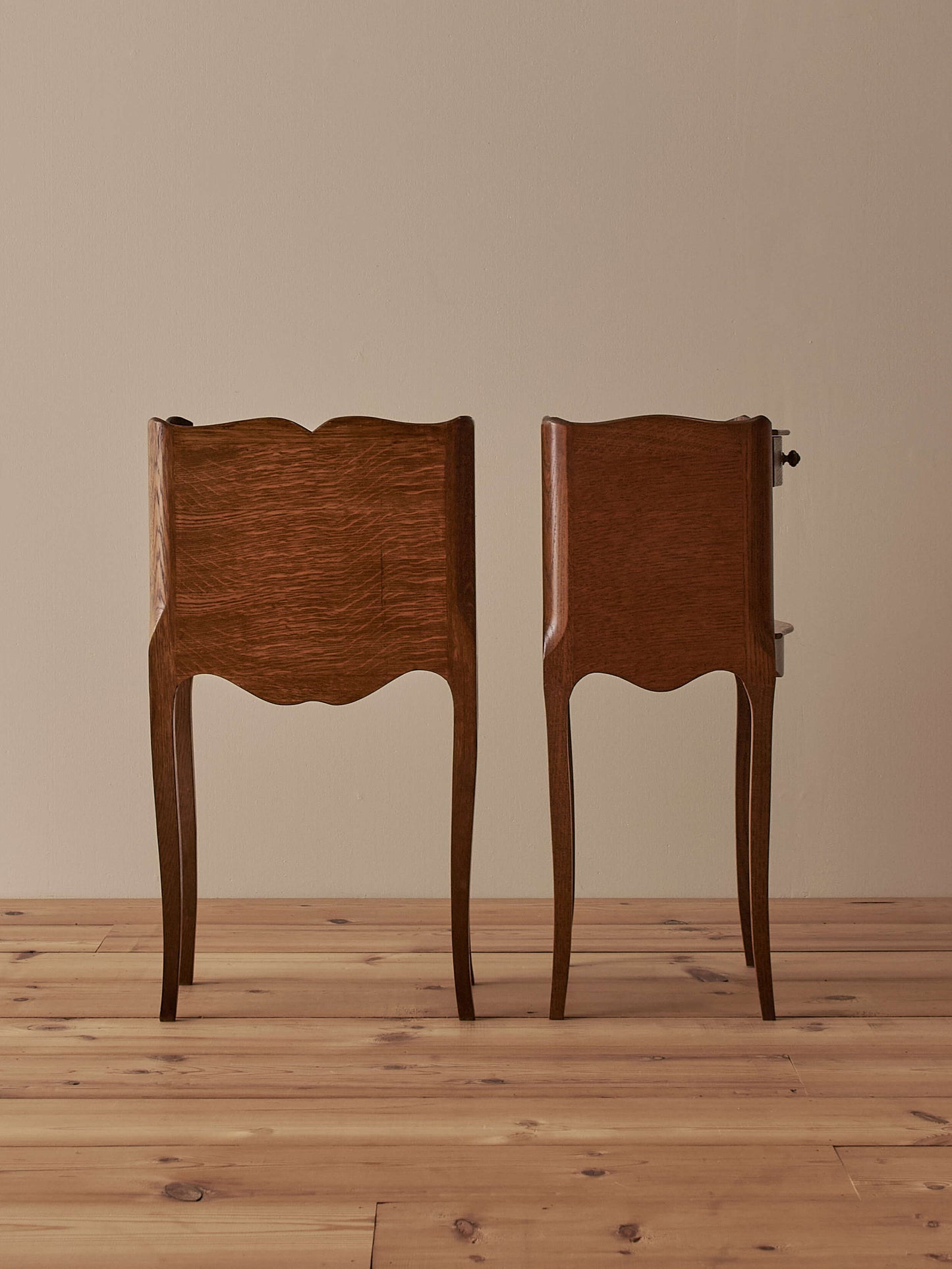 Close-pair of vintage French bedside tables