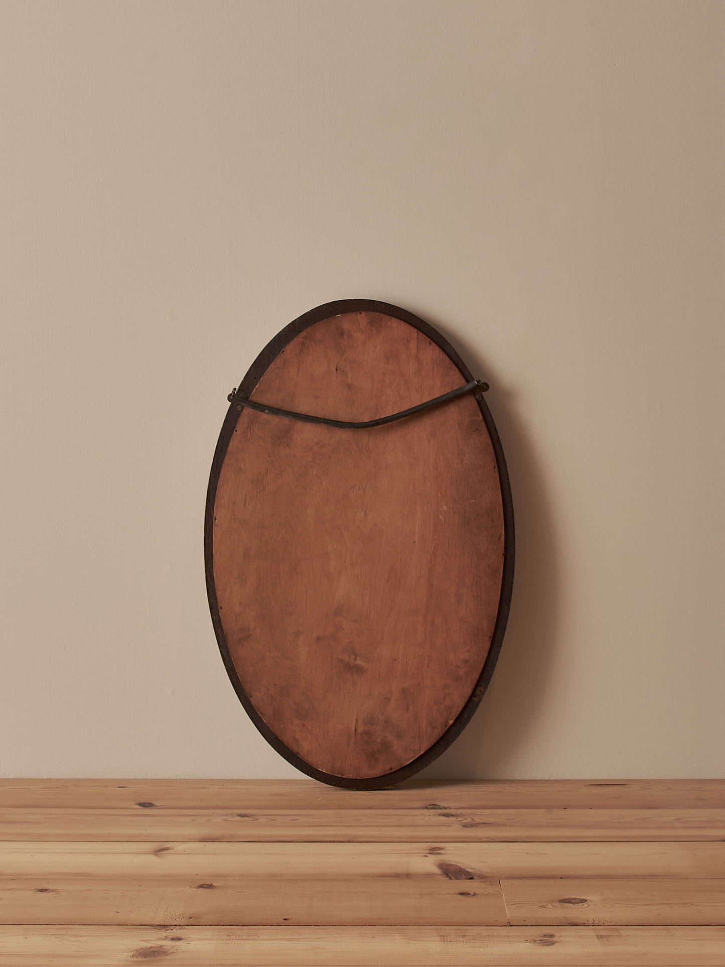 Antique oak oval mirror with circular details