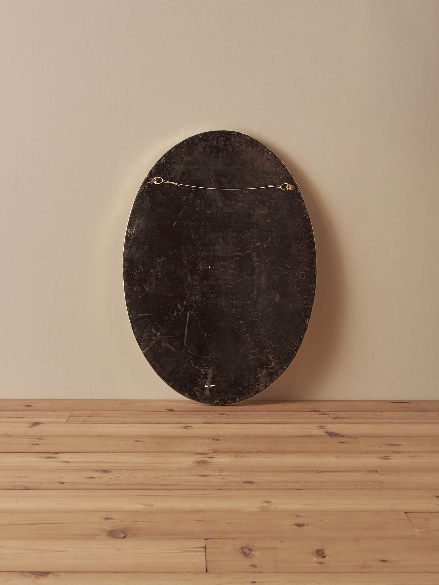 Arts and Crafts oval hammered brass mirror