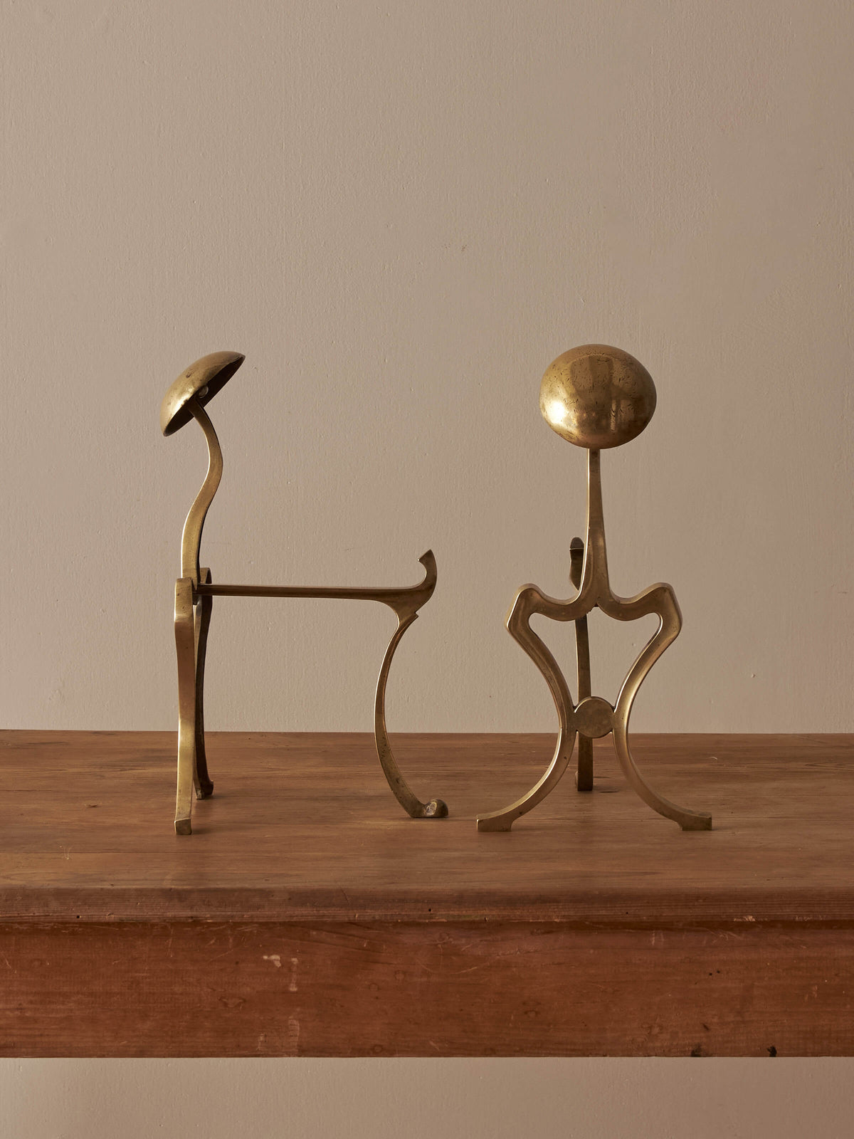 Pair of antique Art Nouveau brass fire dogs