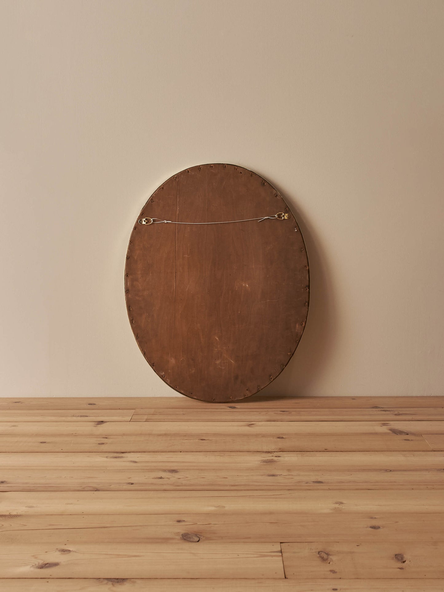 Arts and Crafts oval hammered brass mirror