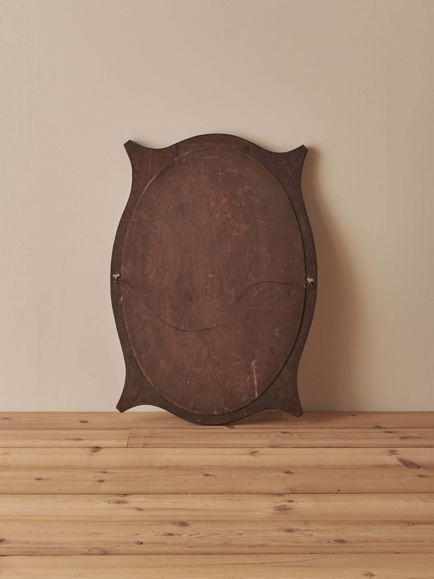 Edwardian oval oak mirror with bobbin detailing