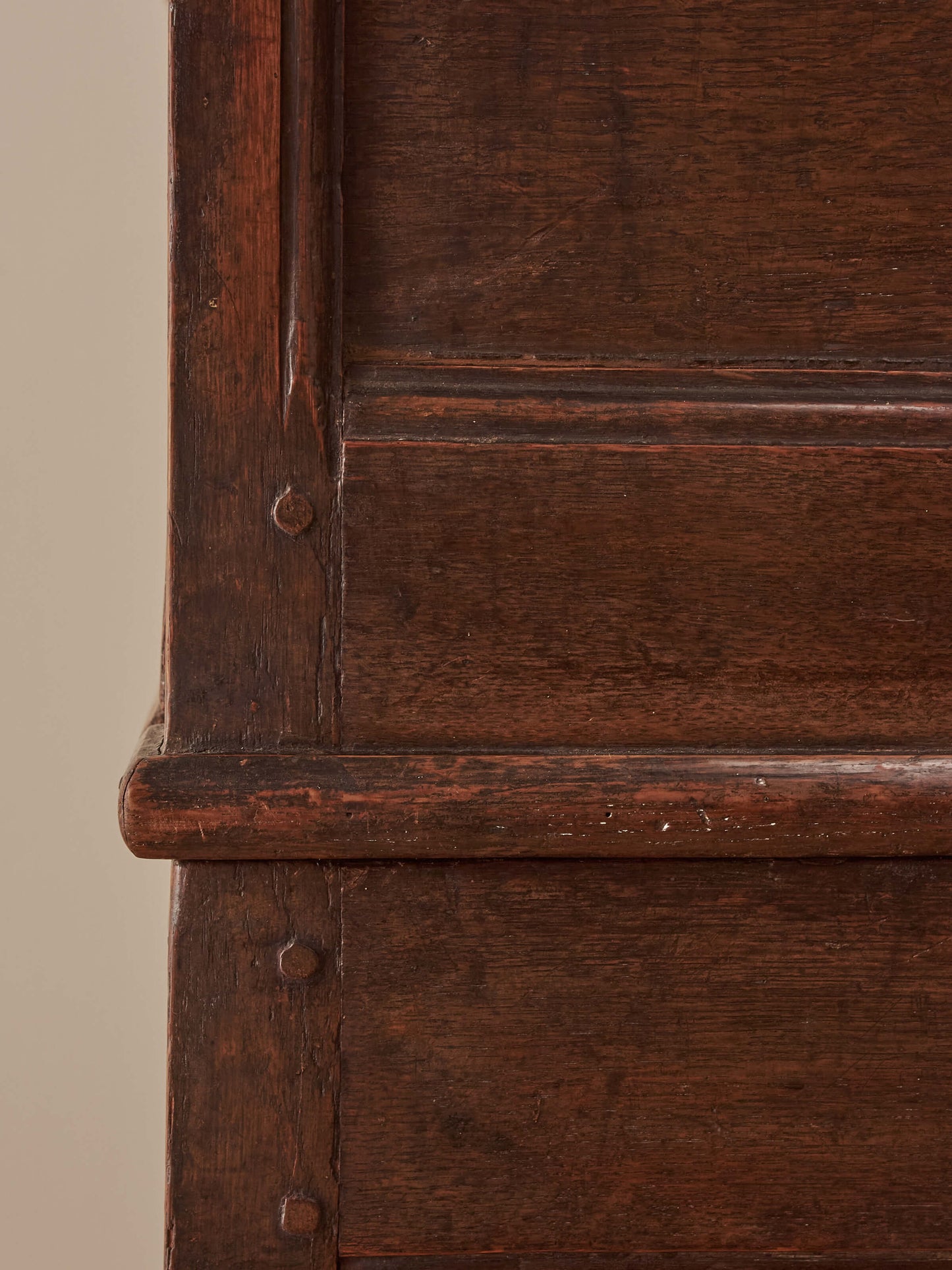 A George I oak chest of drawers on bun feet