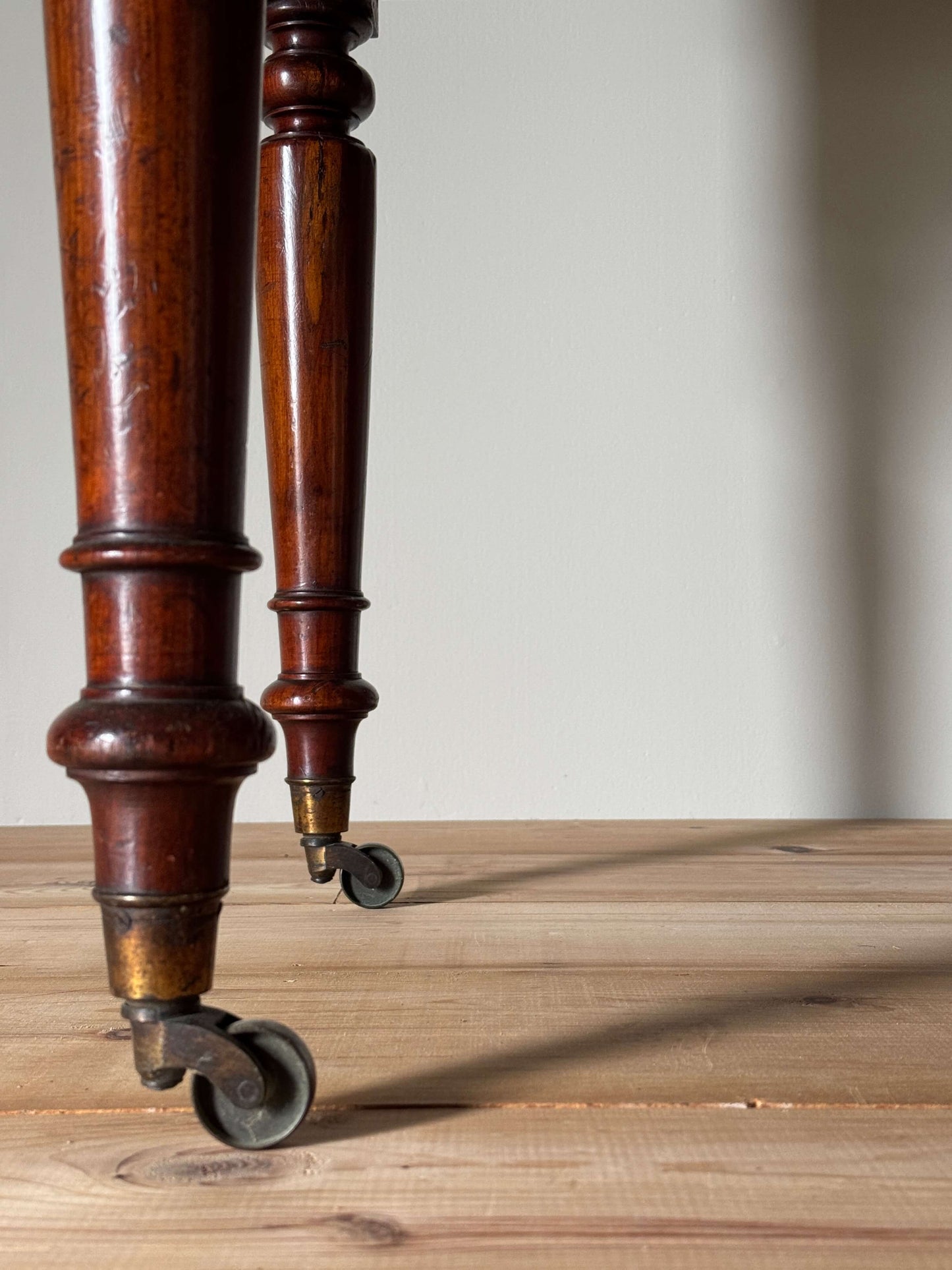 Early Victorian mahogany desk on castors