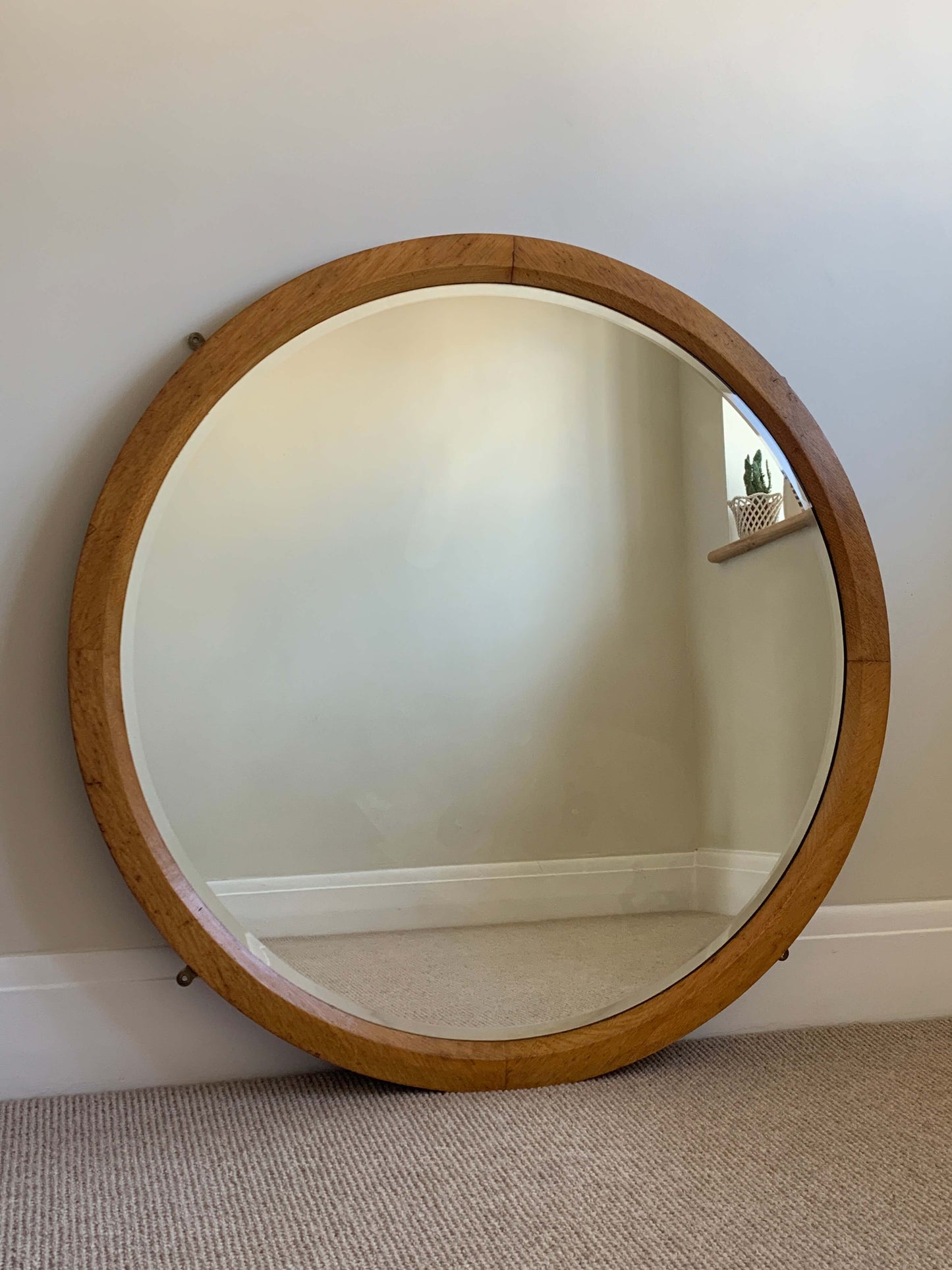 Large antique circular oak bevelled mirror