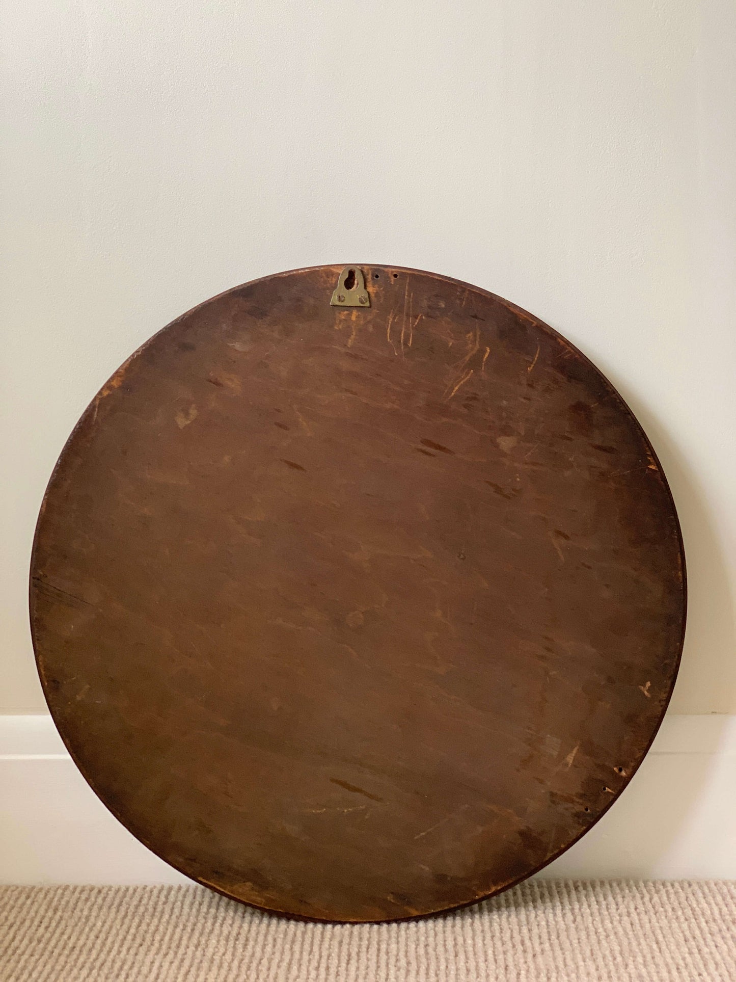 Antique circular bevelled mirror with beaded frame