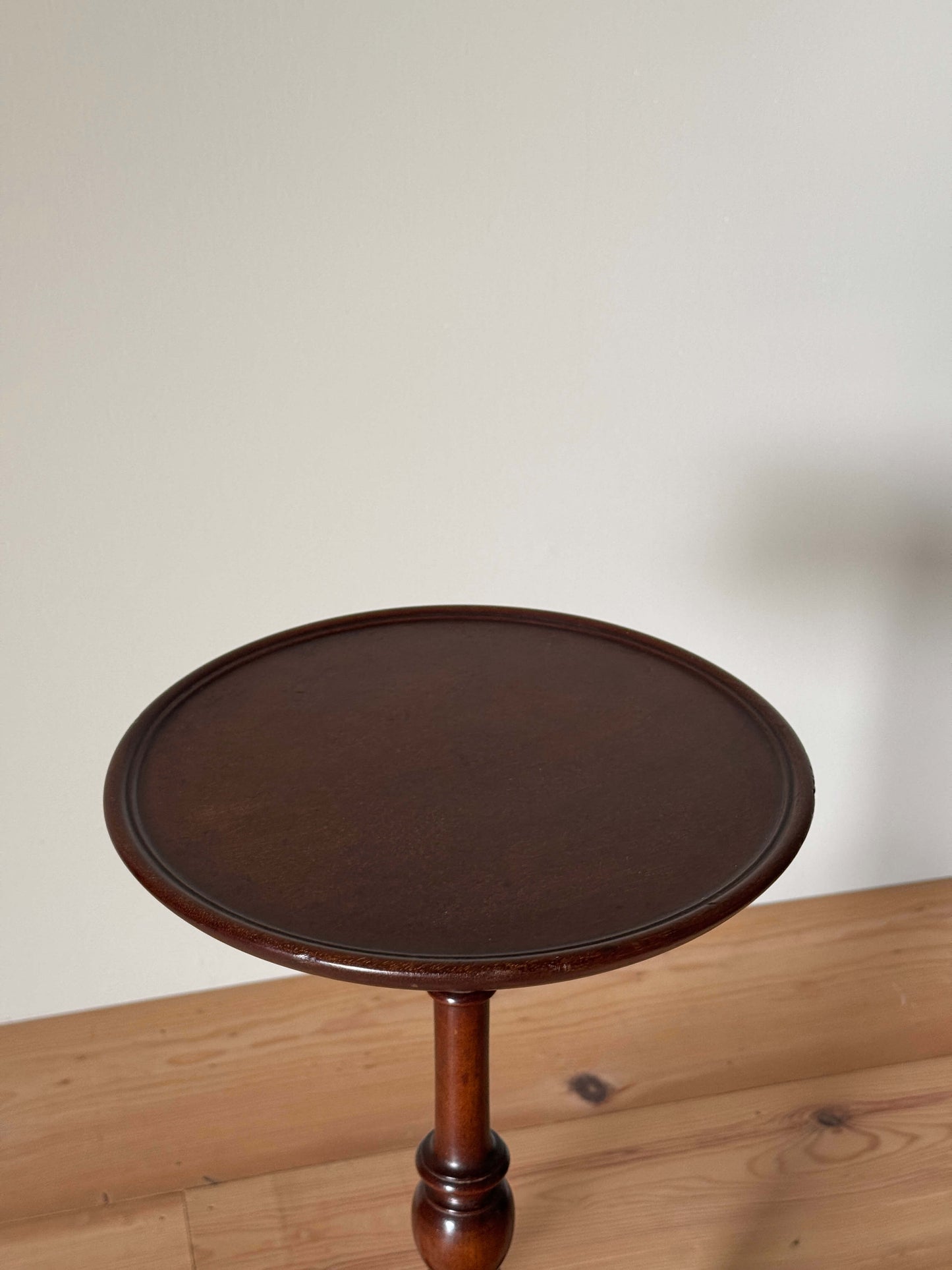 Antique mahogany wine table on splayed legs