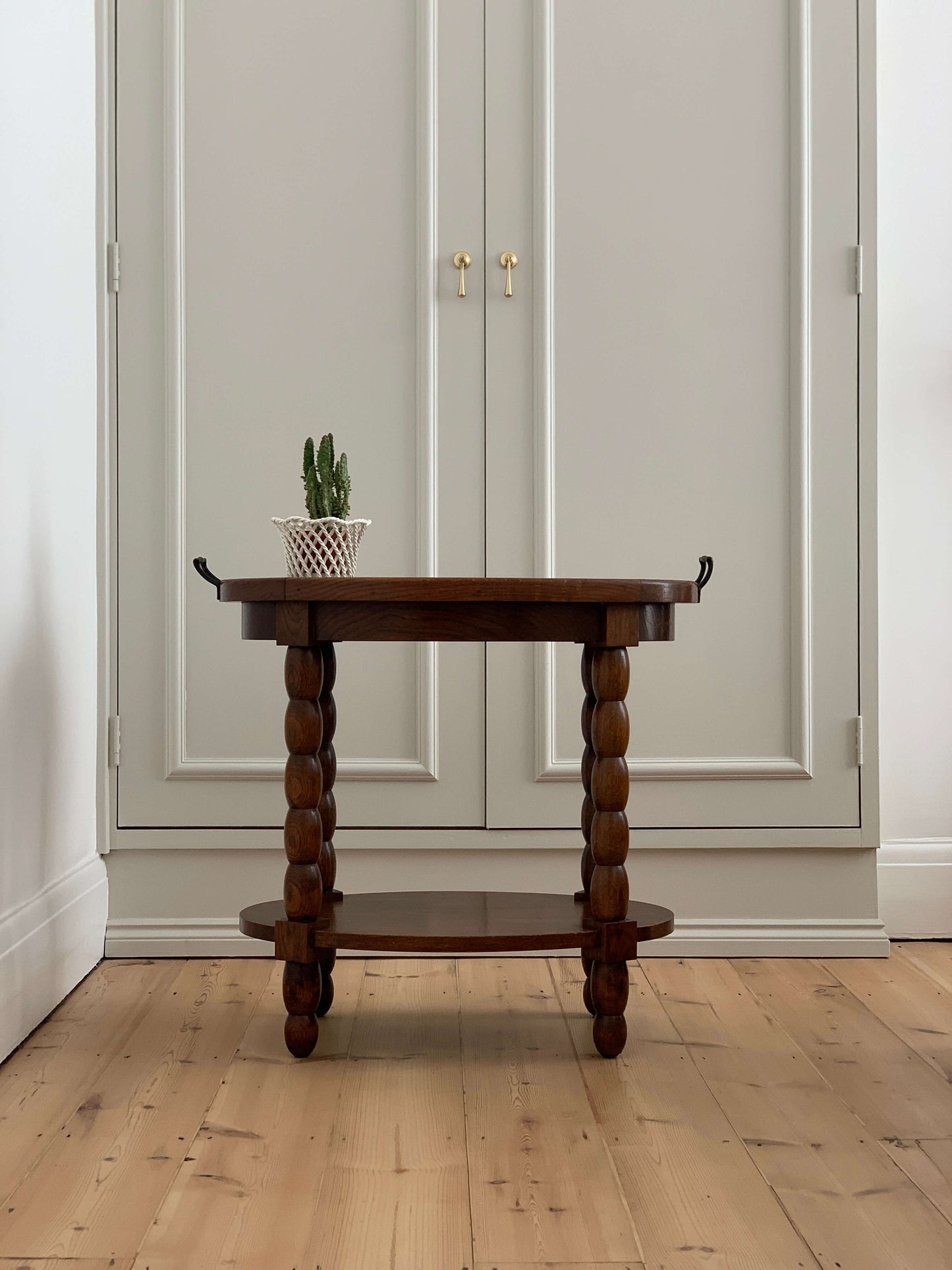 Antique oval bobbin table