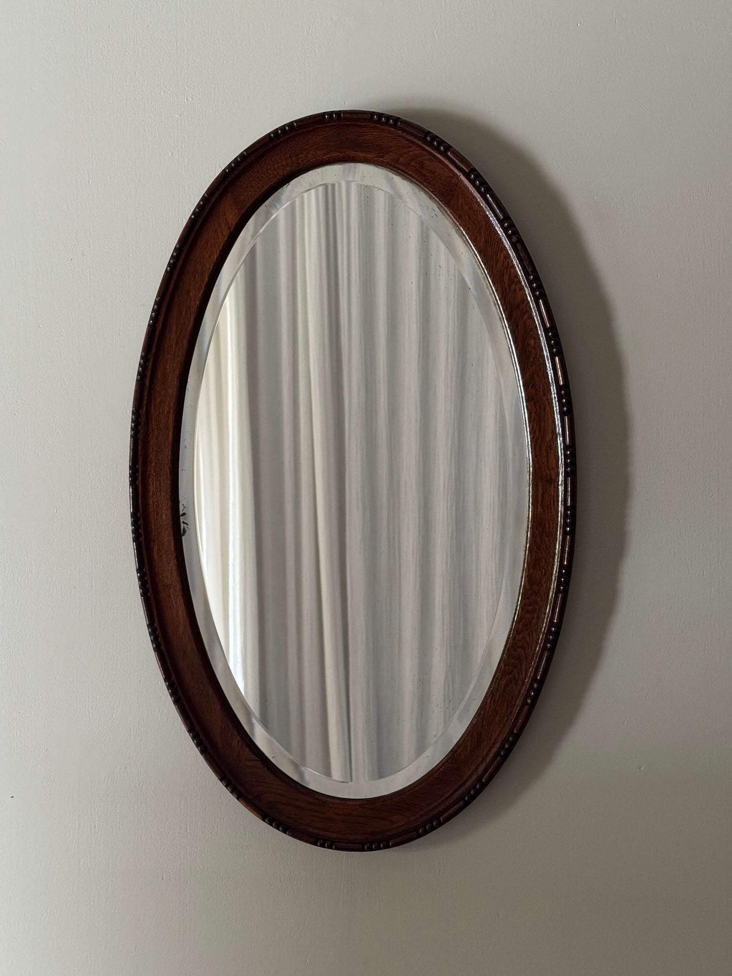 Victorian oval oak mirror with bobbin detailing