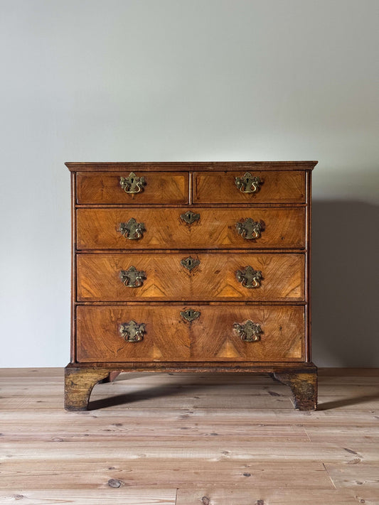 George II walnut crossbanded chest of drawers