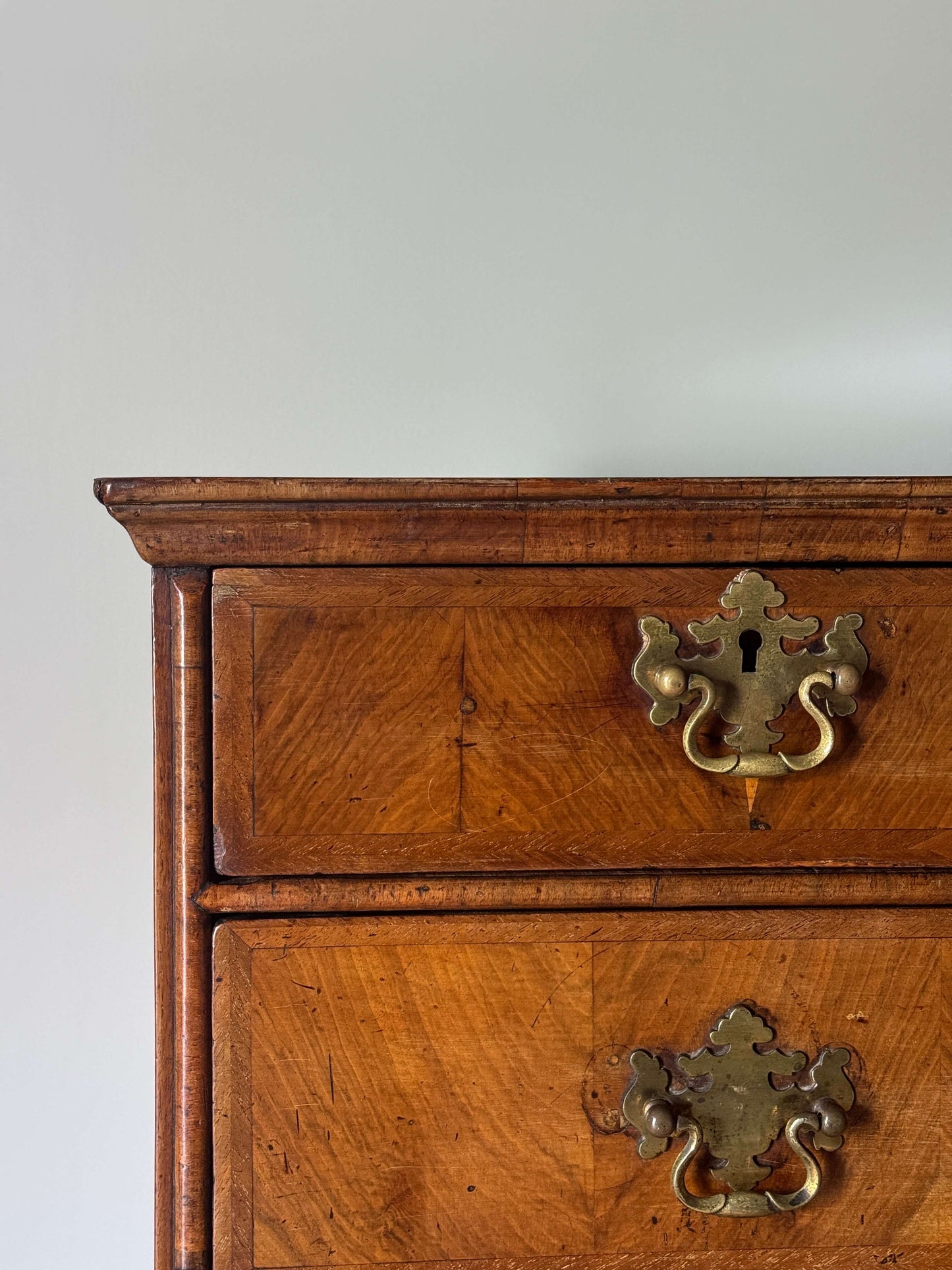 George II walnut crossbanded chest of drawers