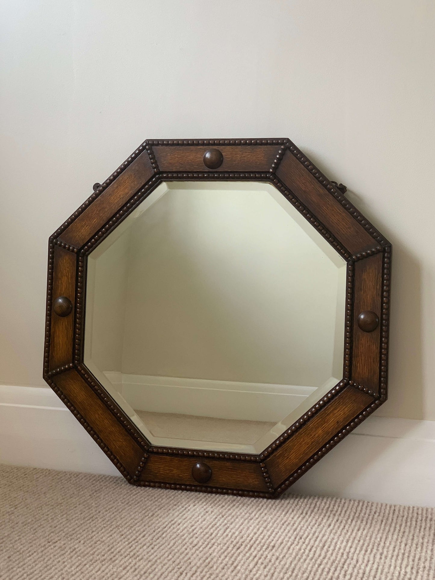 Antique octagonal beaded mirror