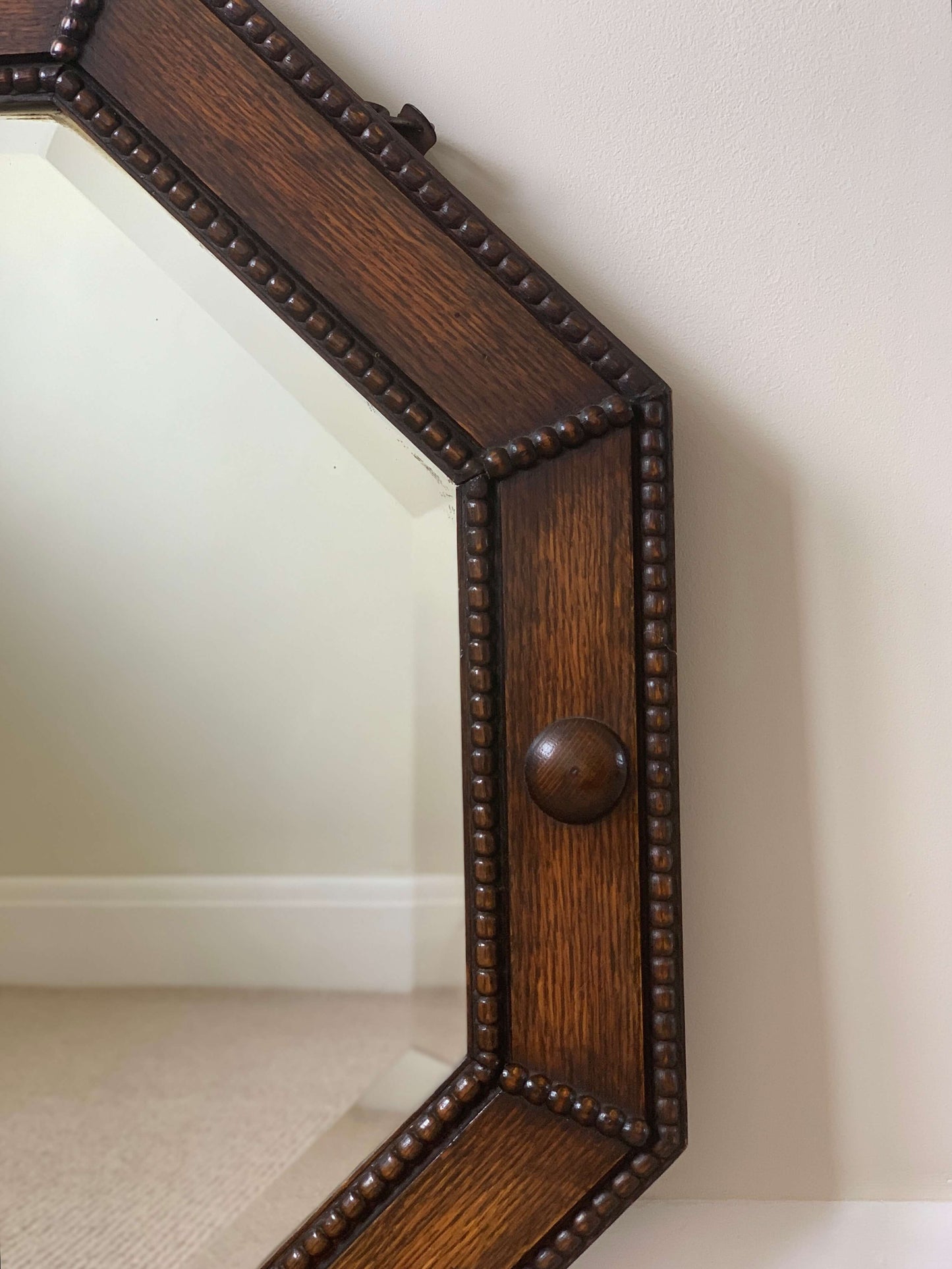 Antique octagonal beaded mirror