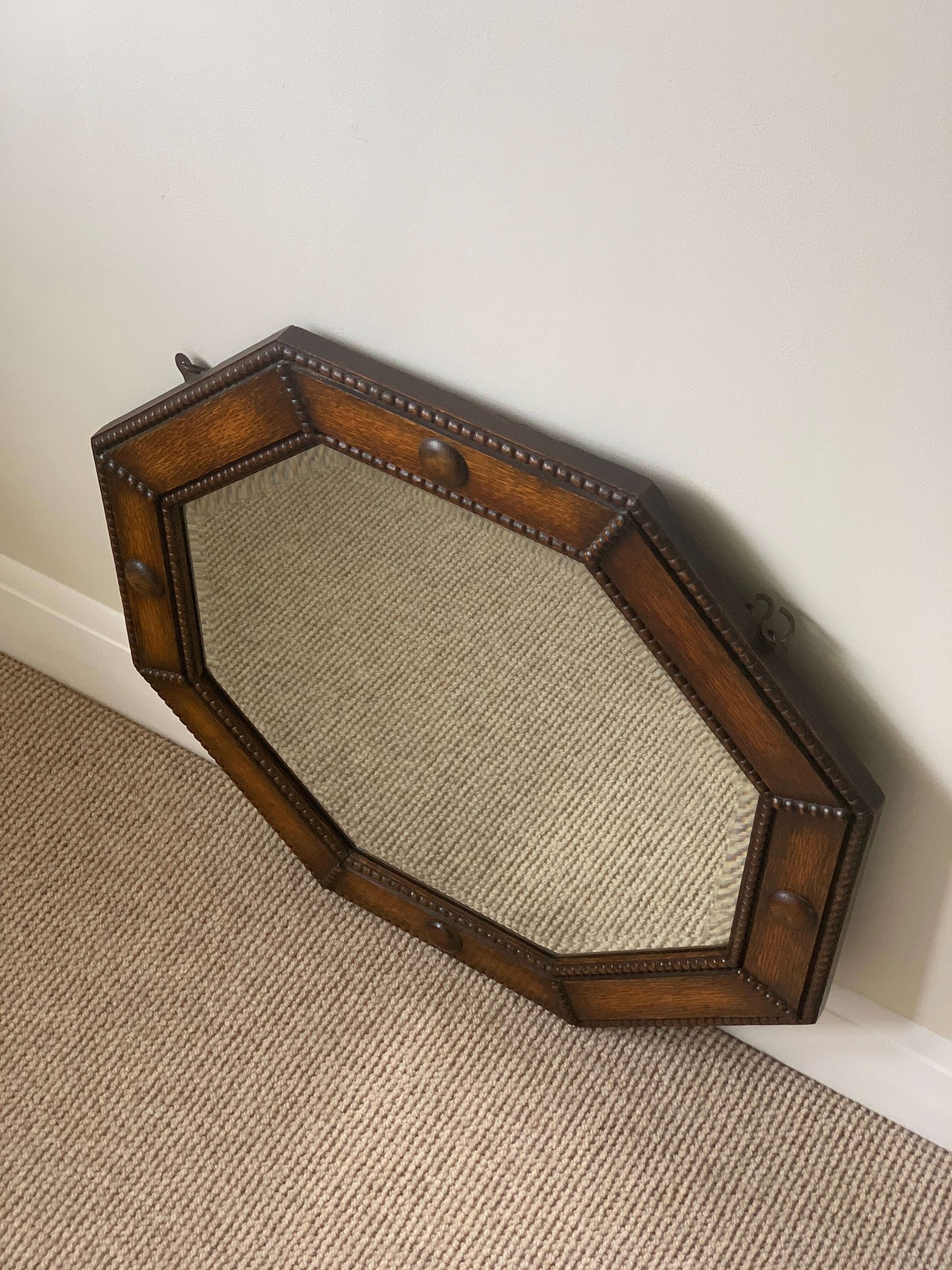 Antique octagonal beaded mirror