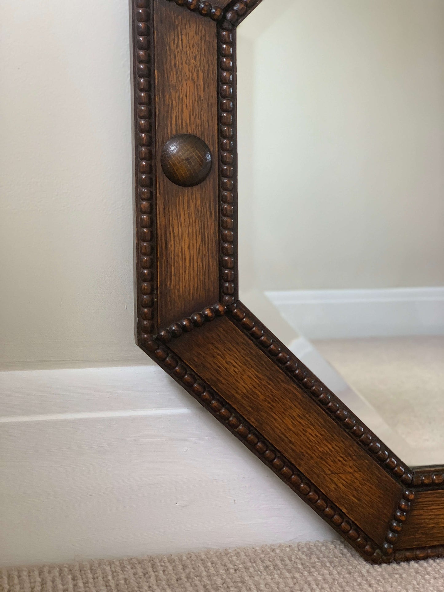 Antique octagonal beaded mirror