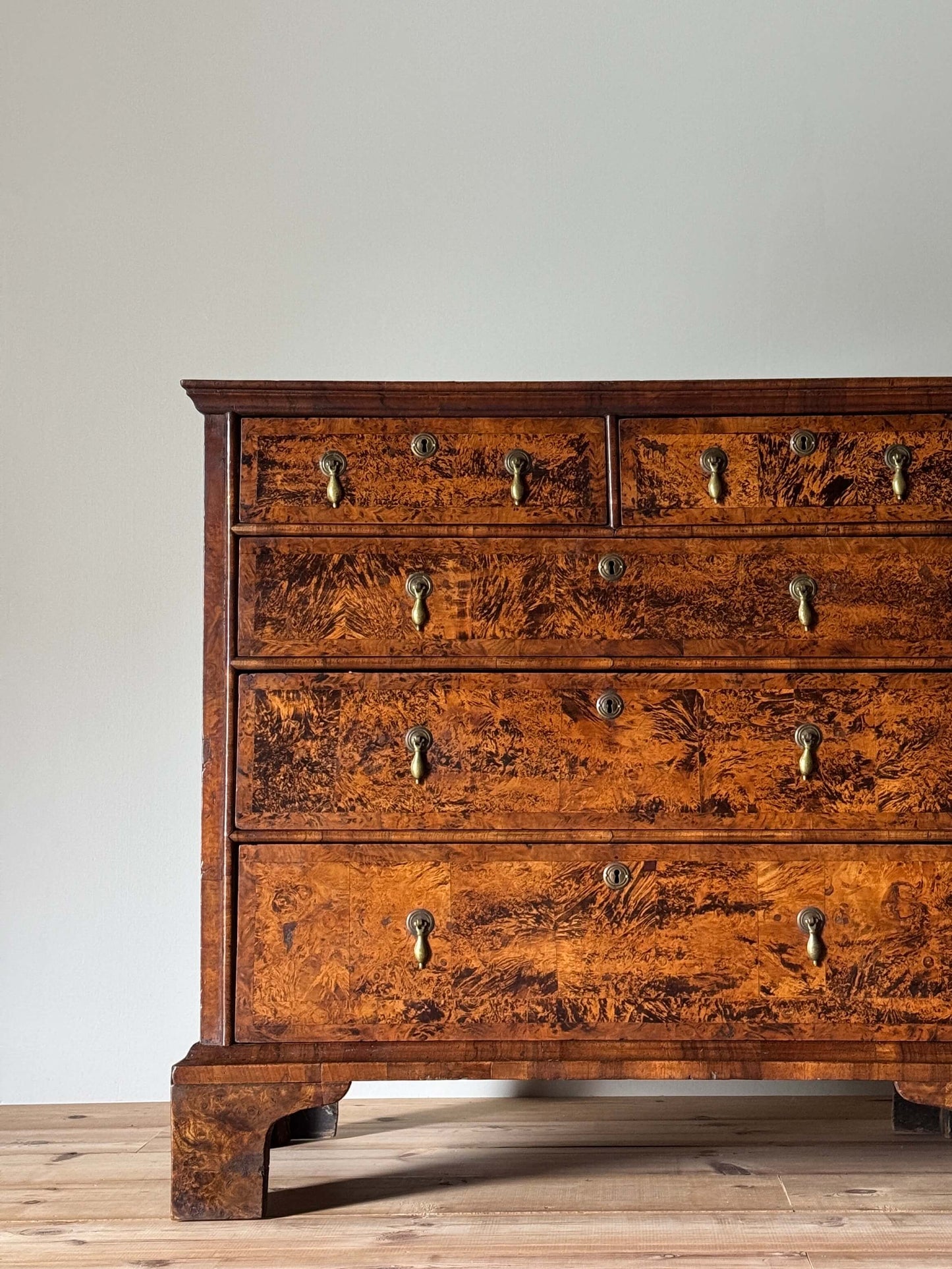 George II walnut and elm crossbanded chest of drawers