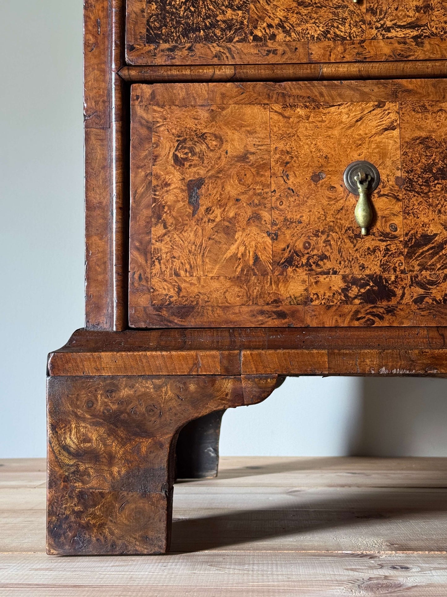 George II walnut and elm crossbanded chest of drawers