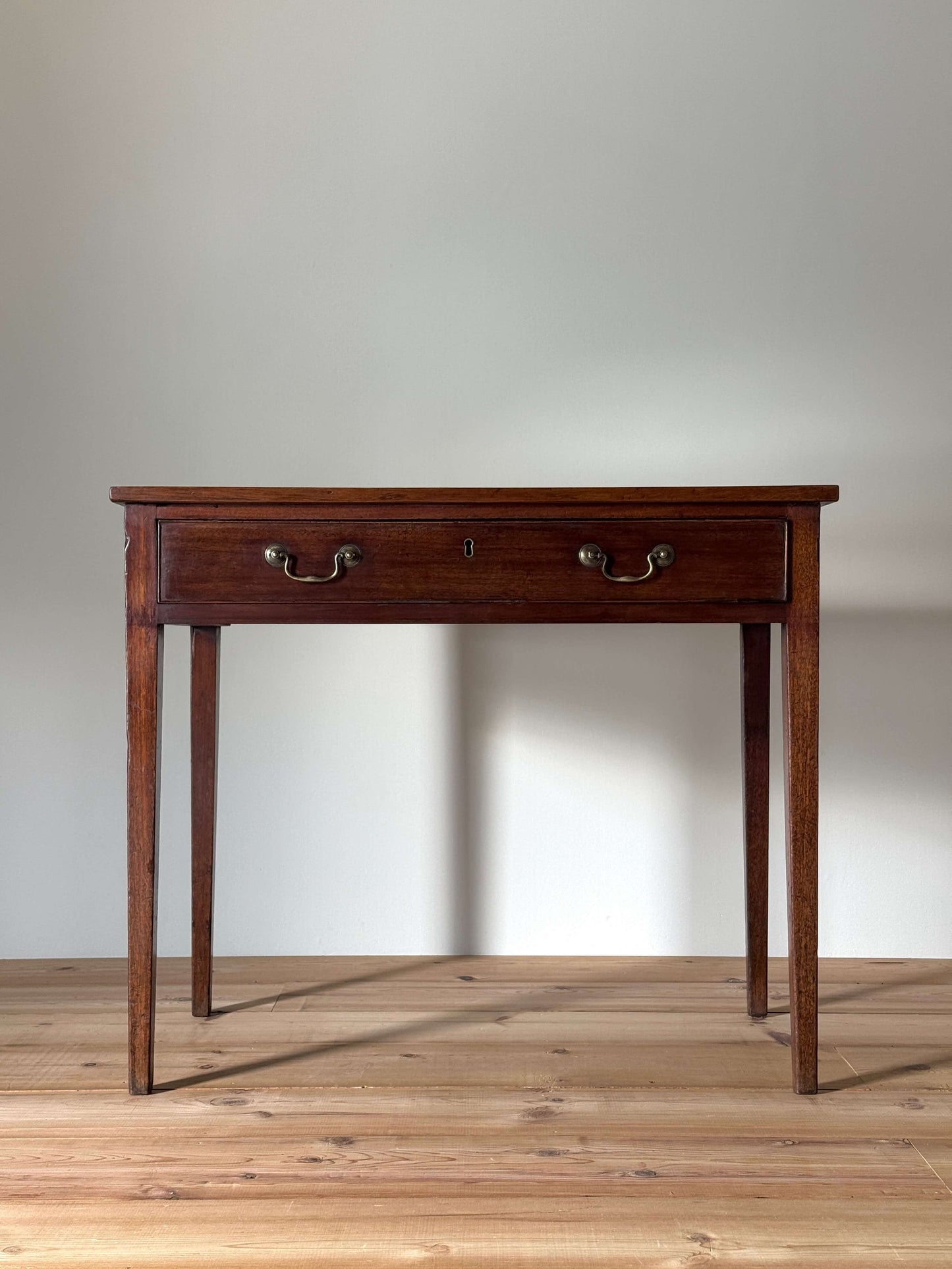 Georgian mahogany console table with drawer