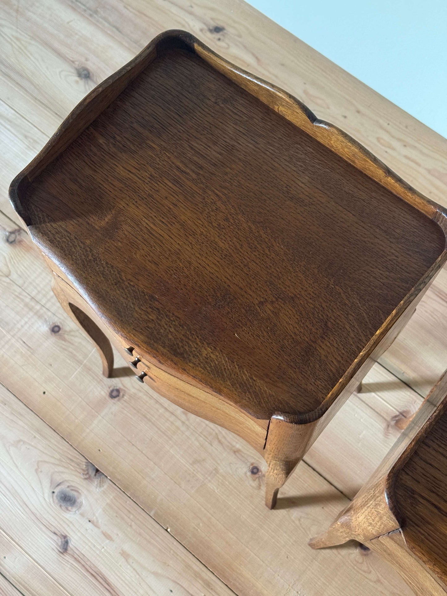 Pair of French bedside tables with three drawers