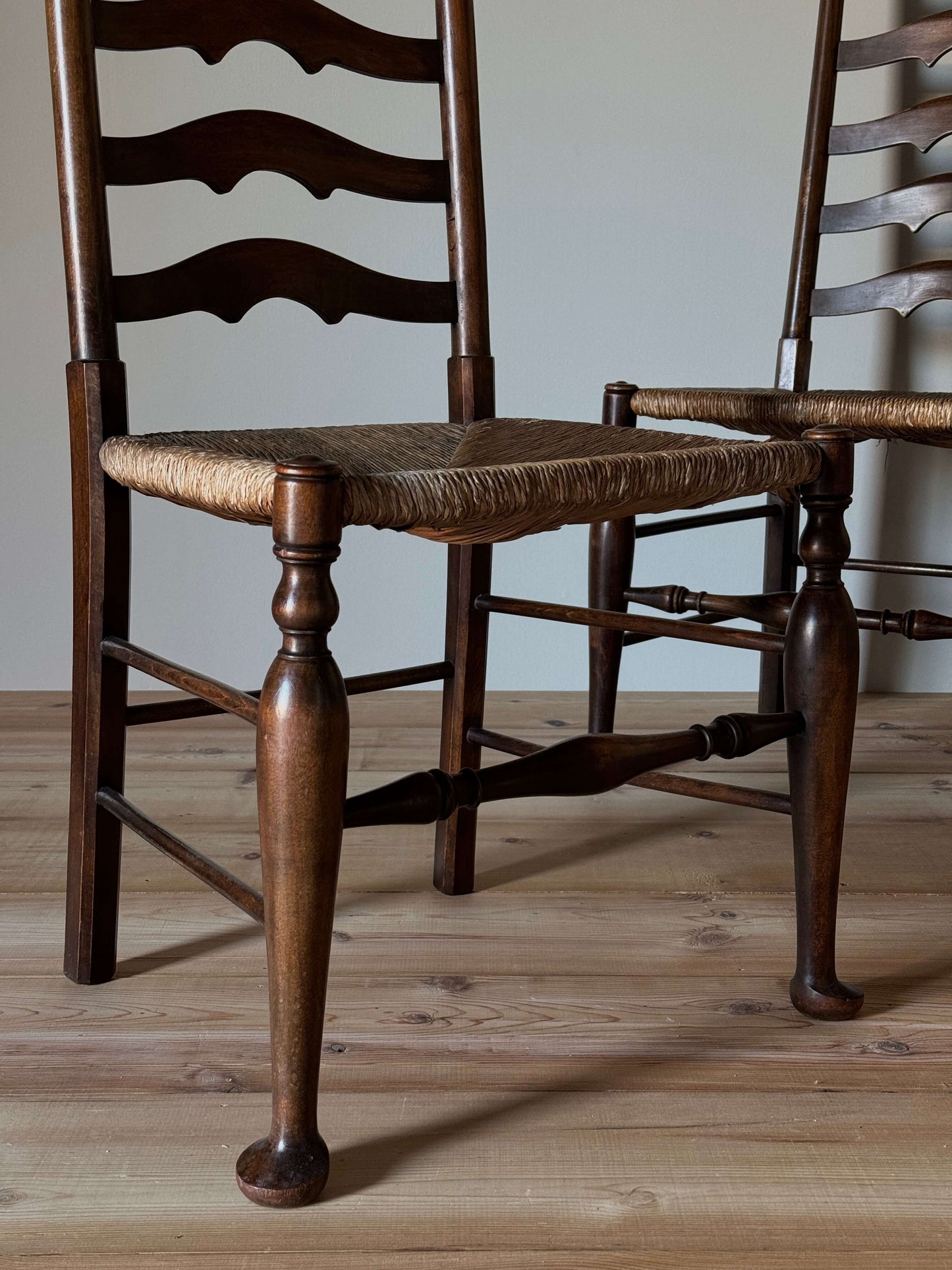 Set of four antique beech ladder back dining chairs