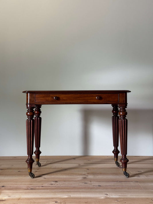 Early Victorian mahogany console table with fluted legs