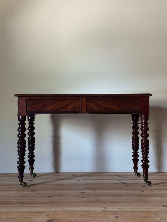 Victorian mahogany console table raised on turned legs