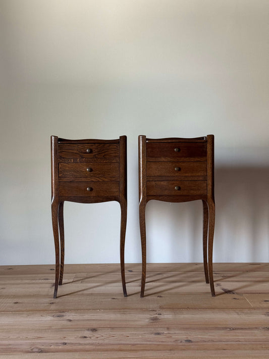 Pair of French bedside tables with three drawers
