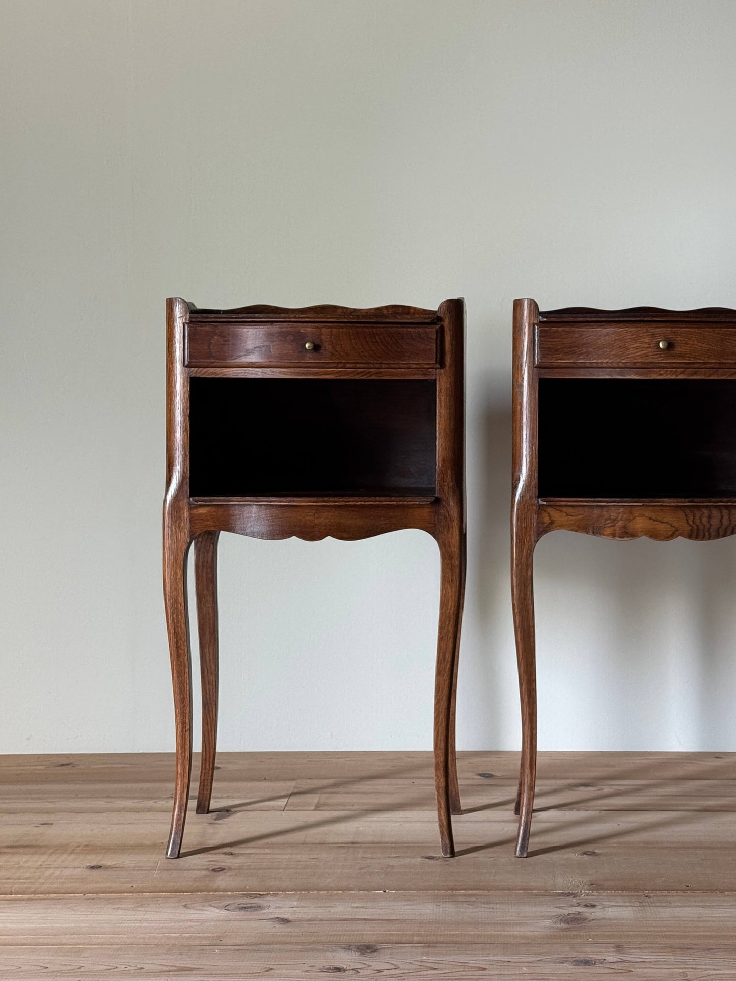 Pair of French mid-century bedside tables with single drawer
