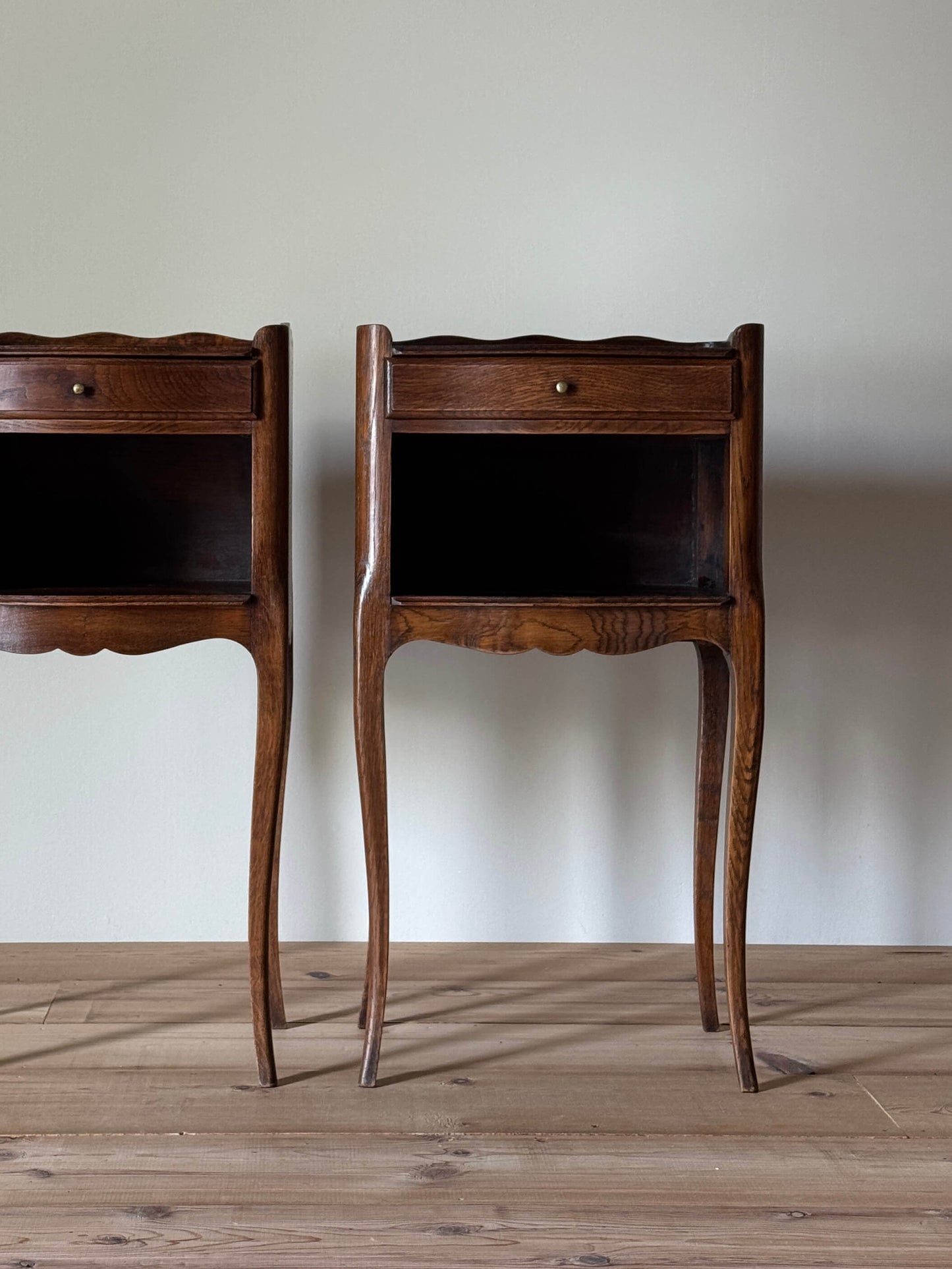Pair of French mid-century bedside tables with single drawer