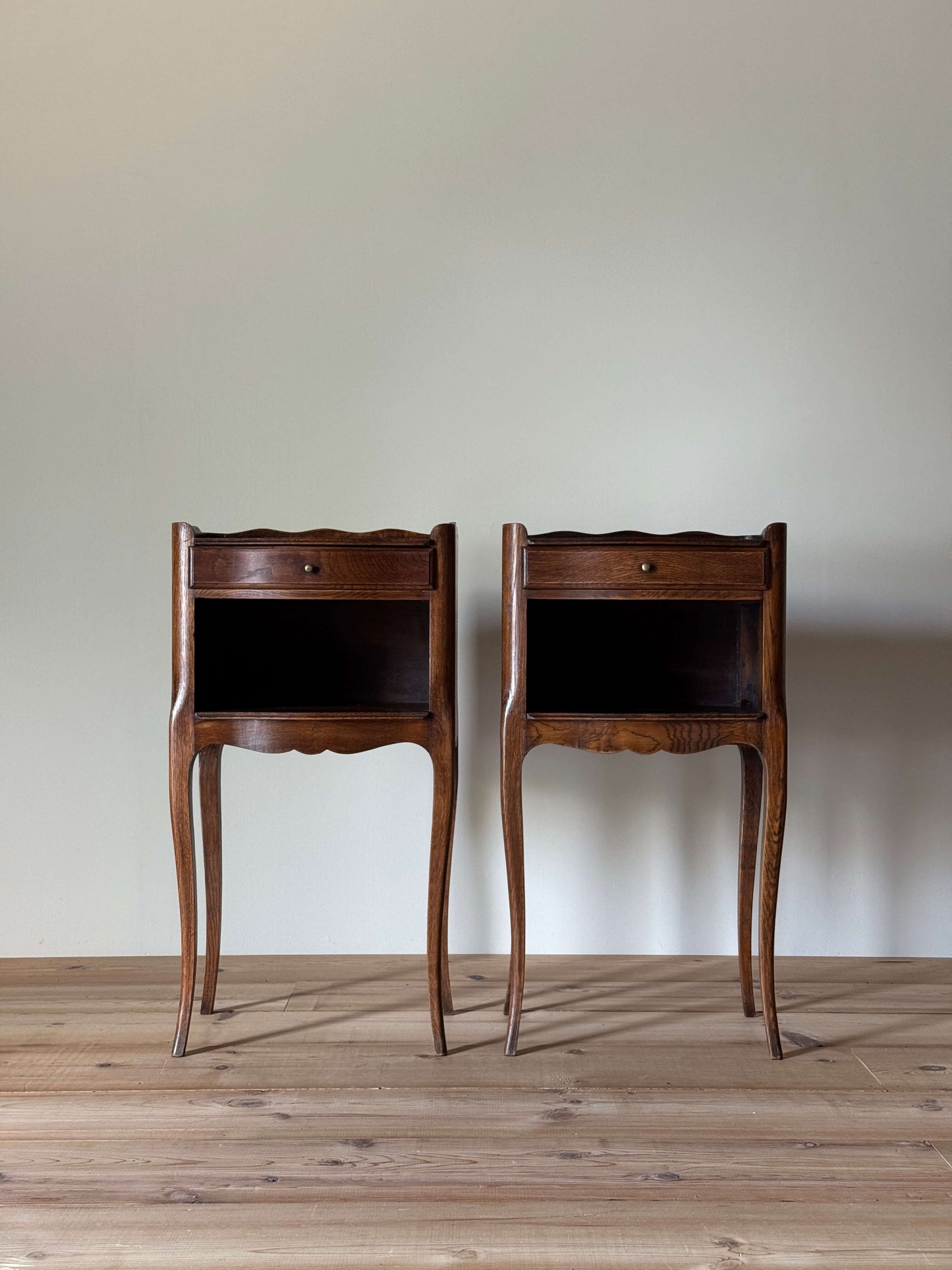 Pair of French mid-century bedside tables with single drawer