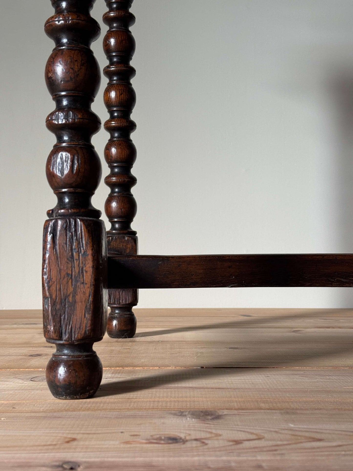 Antique oak console table with carved drawer