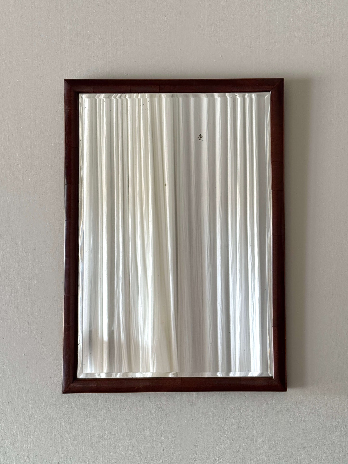 Antique mahogany cushion mirror