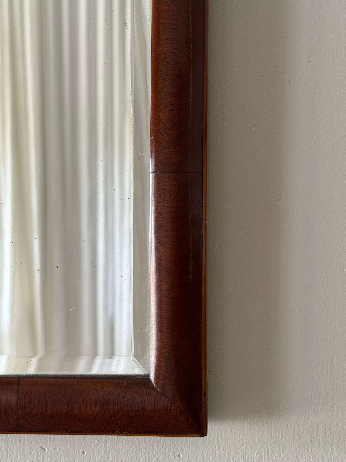 Antique mahogany cushion mirror