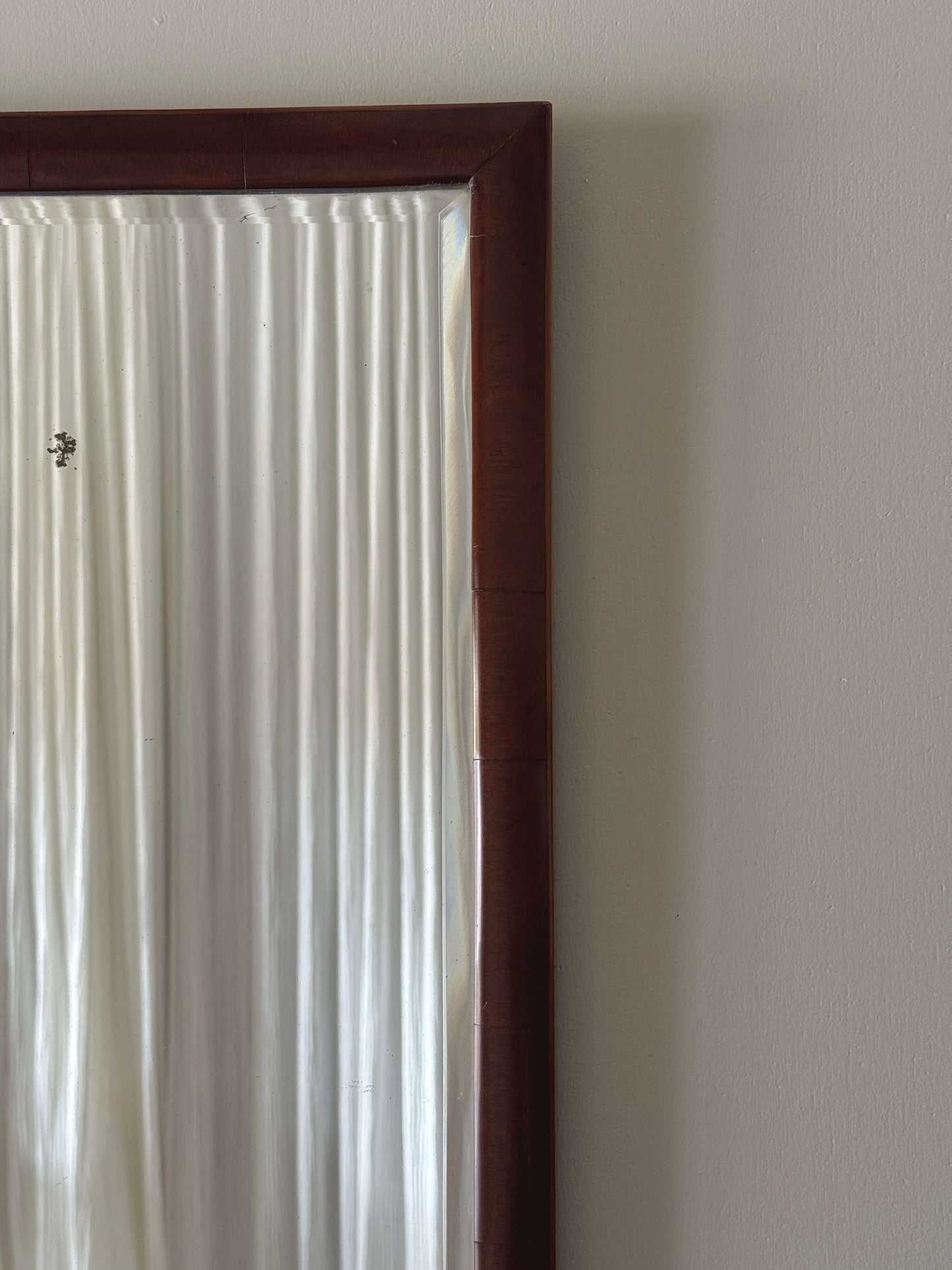 Antique mahogany cushion mirror