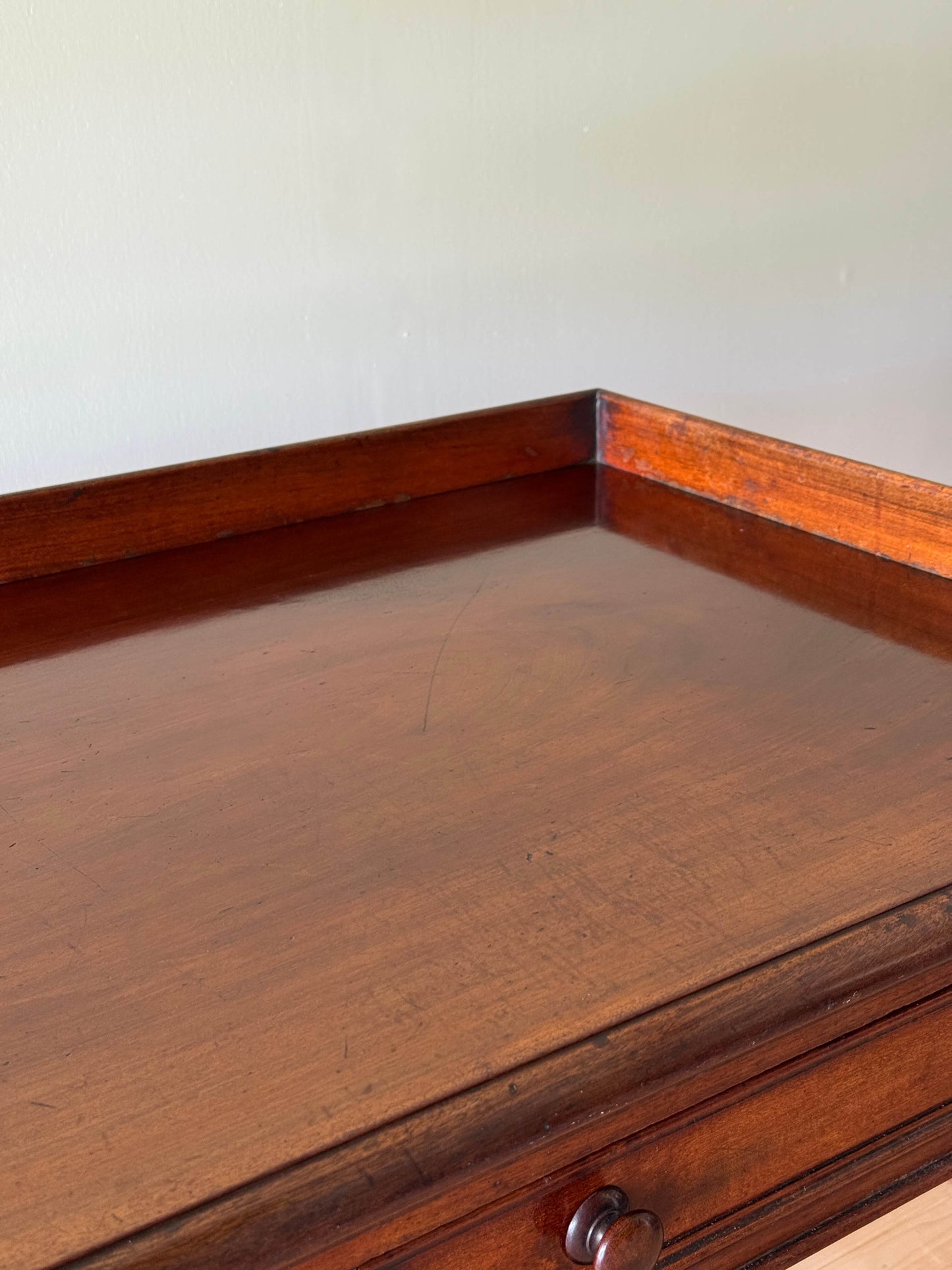 Victorian mahogany desk raised on fluted legs