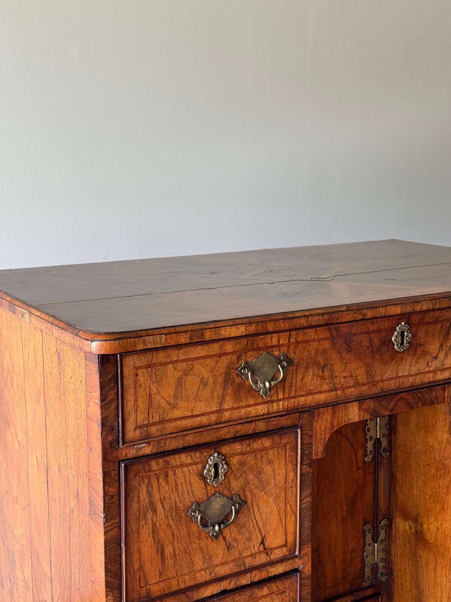 George II walnut cross-banded kneehole desk