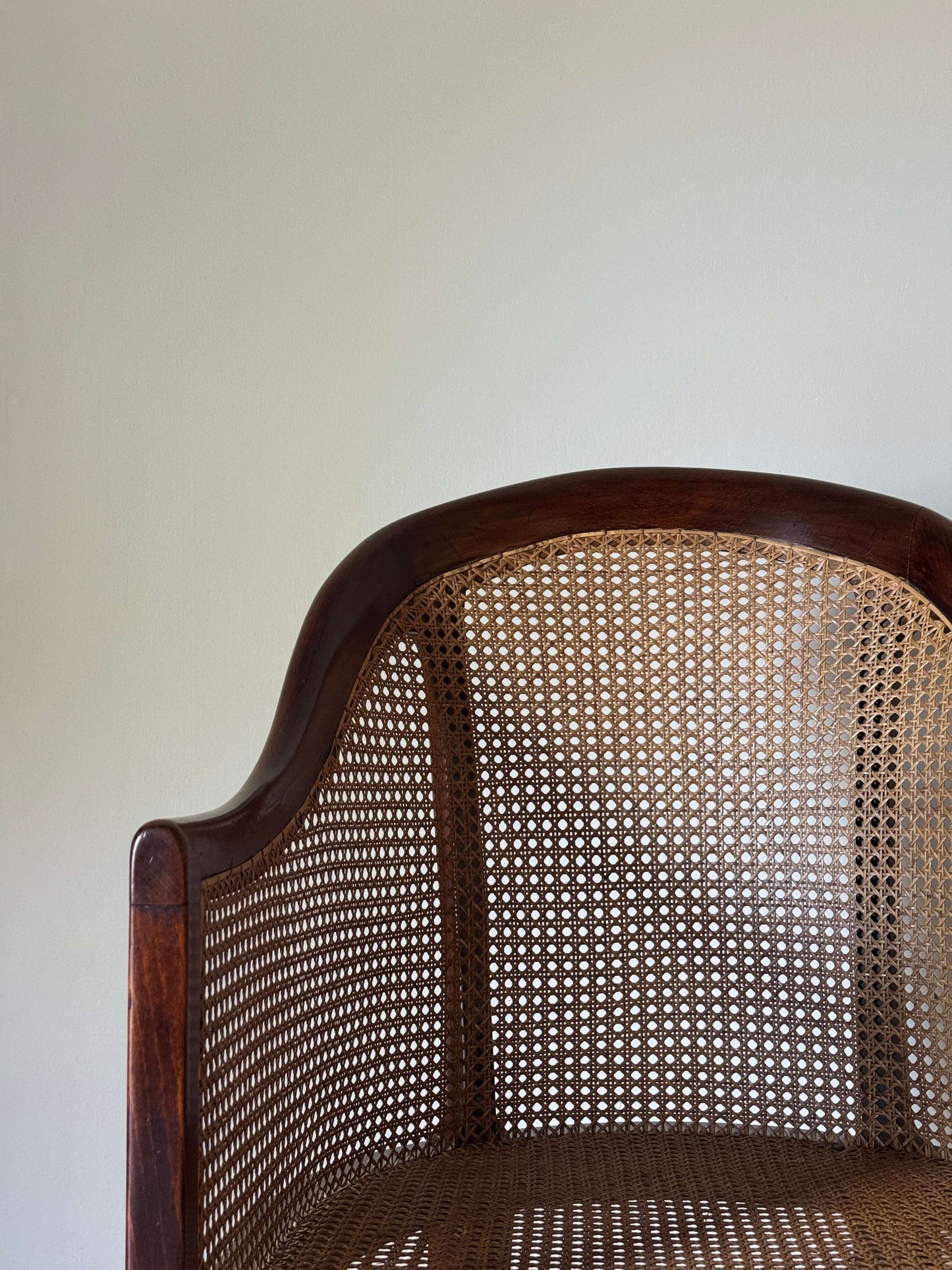 Antique beech bergere chair on castors
