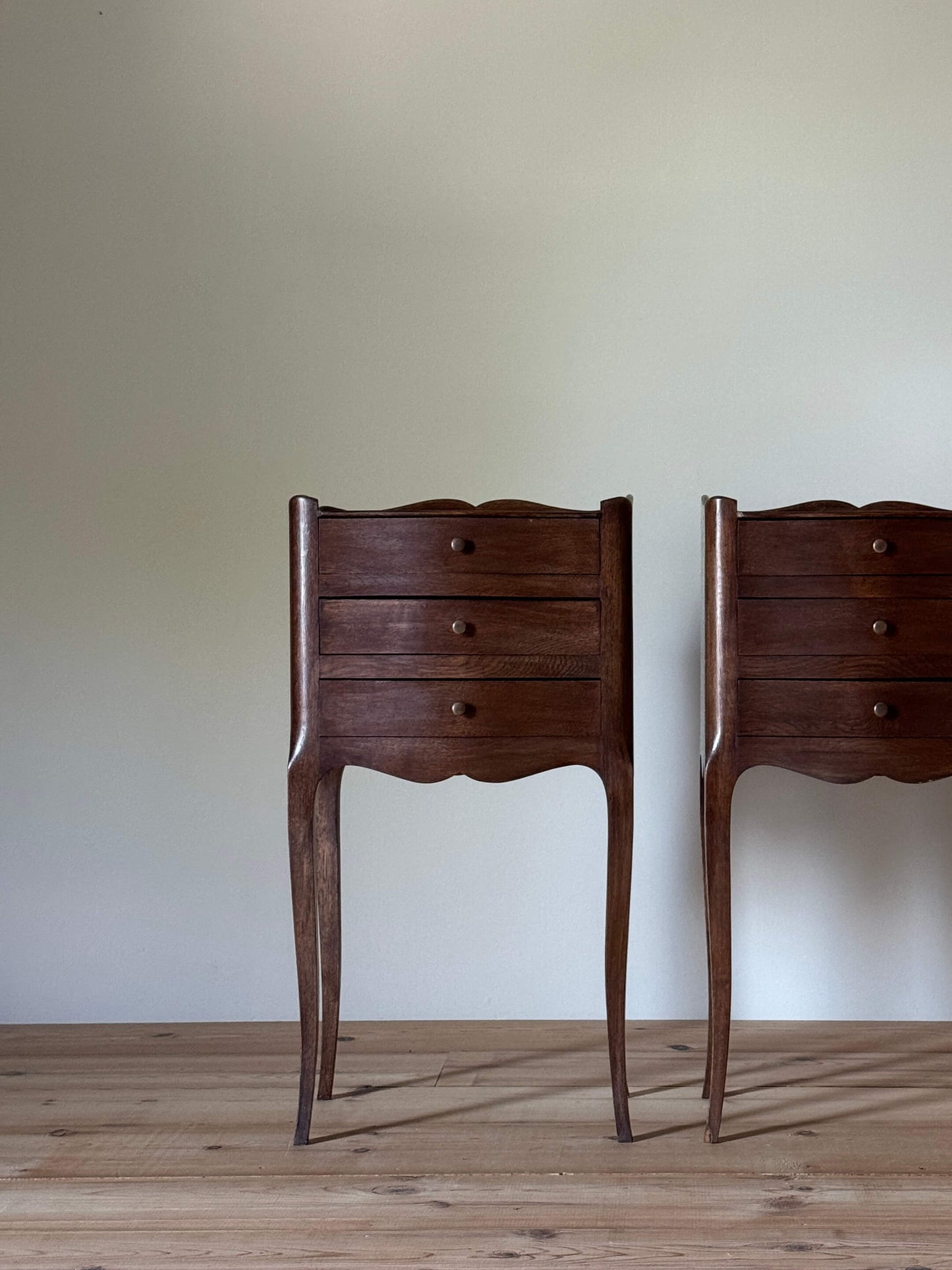 Pair of French vintage bedside tables with three drawers